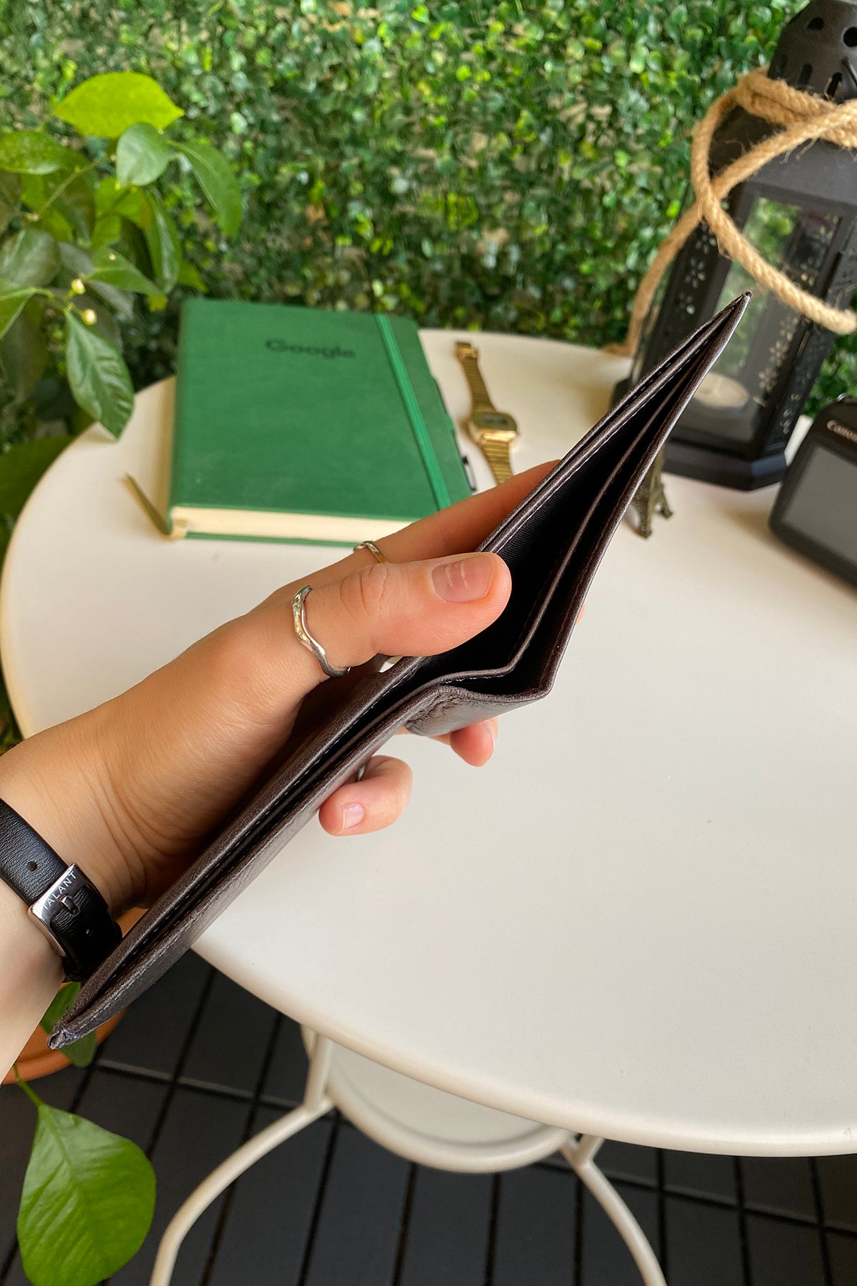 Atlanta Genuine Leather Trifold Wallet in various colors with coin pouch compartment, showcasing its sleek design and high-quality leather.