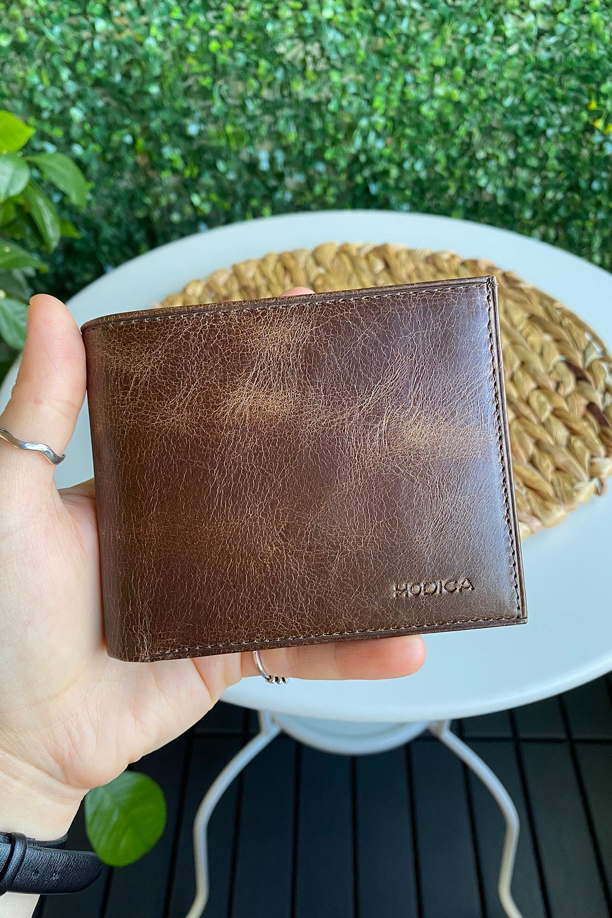 Atlanta Genuine Leather Trifold Wallet in various colors with coin pouch compartment, showcasing its sleek design and high-quality leather.