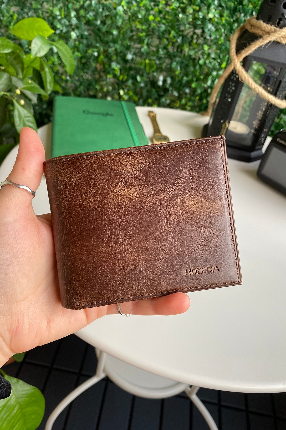 Atlanta Genuine Leather Trifold Wallet in various colors with coin pouch compartment, showcasing its sleek design and high-quality leather.