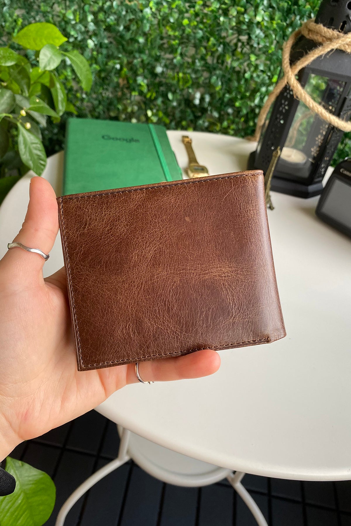 Atlanta Genuine Leather Trifold Wallet in various colors with coin pouch compartment, showcasing its sleek design and high-quality leather.