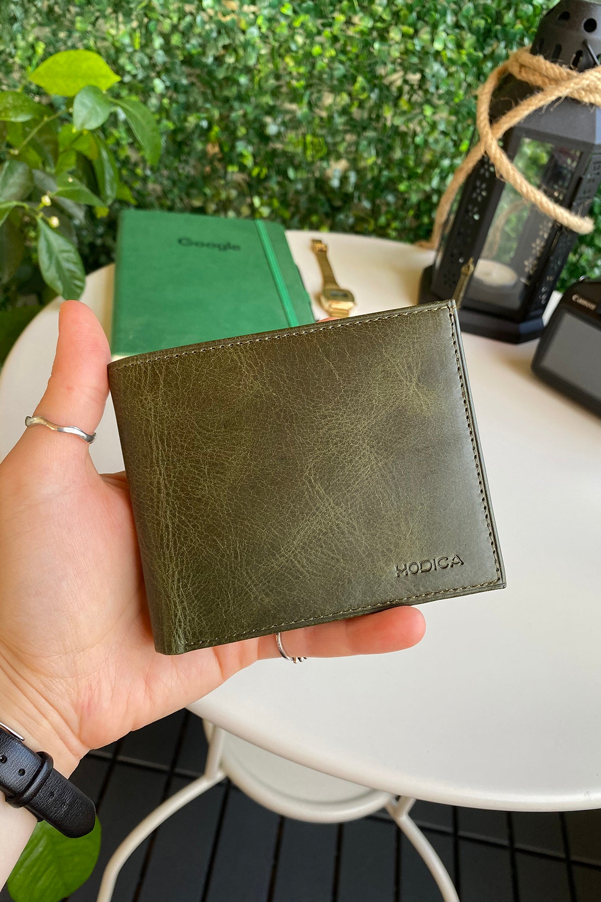 Atlanta Genuine Leather Trifold Wallet in various colors with coin pouch compartment, showcasing its sleek design and high-quality leather.