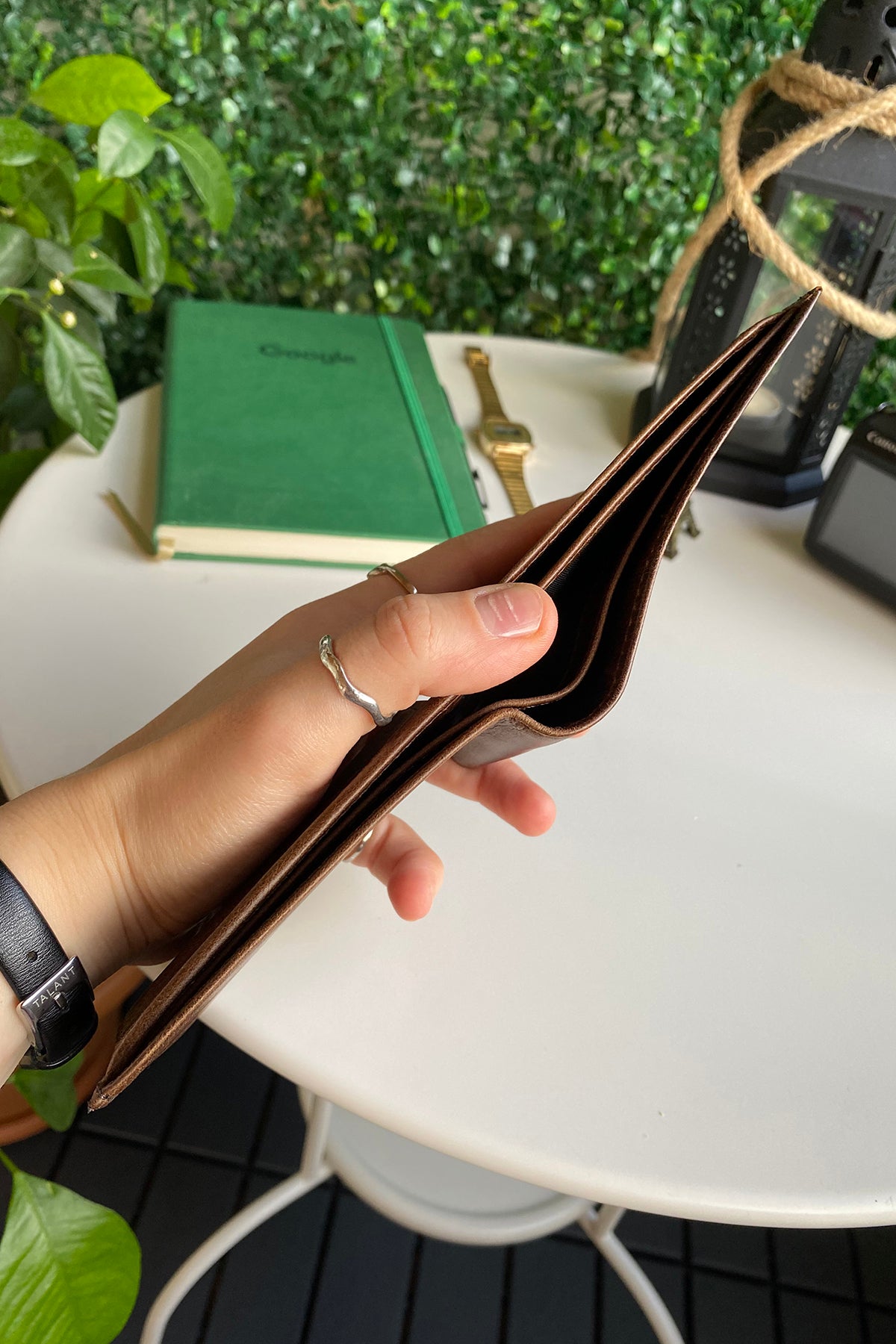 Atlanta Genuine Leather Trifold Wallet in various colors with coin pouch compartment, showcasing its sleek design and high-quality leather.