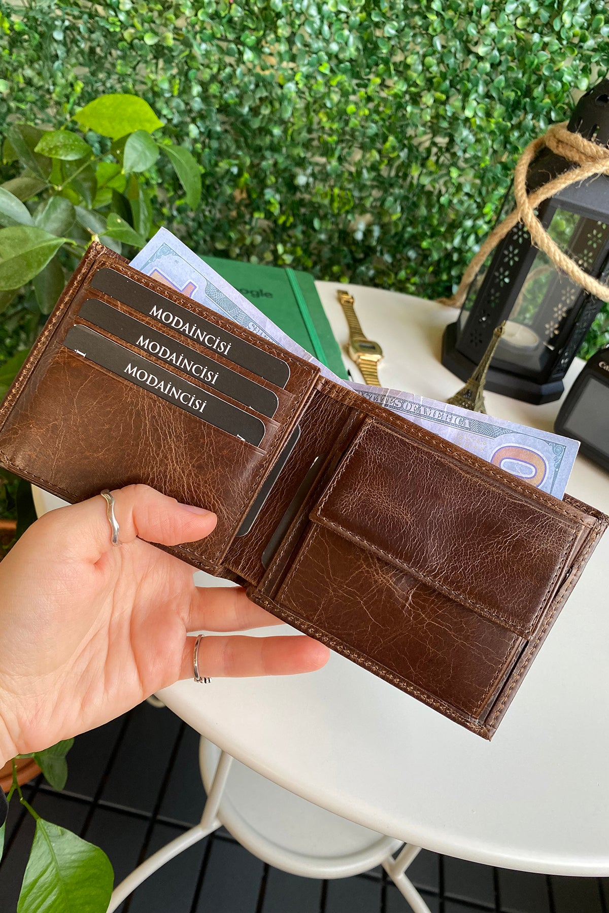 Atlanta Genuine Leather Trifold Wallet in various colors with coin pouch compartment, showcasing its sleek design and high-quality leather.