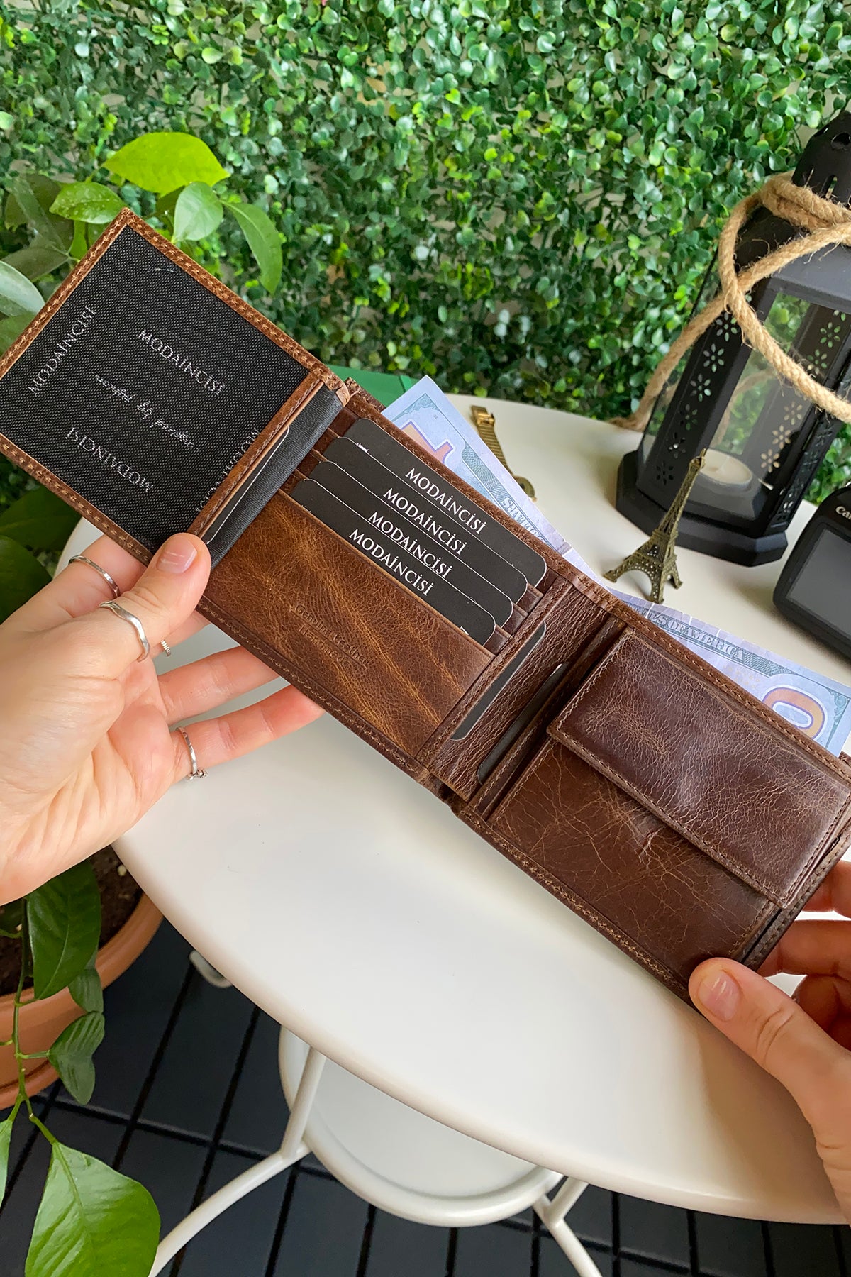 Atlanta Genuine Leather Trifold Wallet in various colors with coin pouch compartment, showcasing its sleek design and high-quality leather.