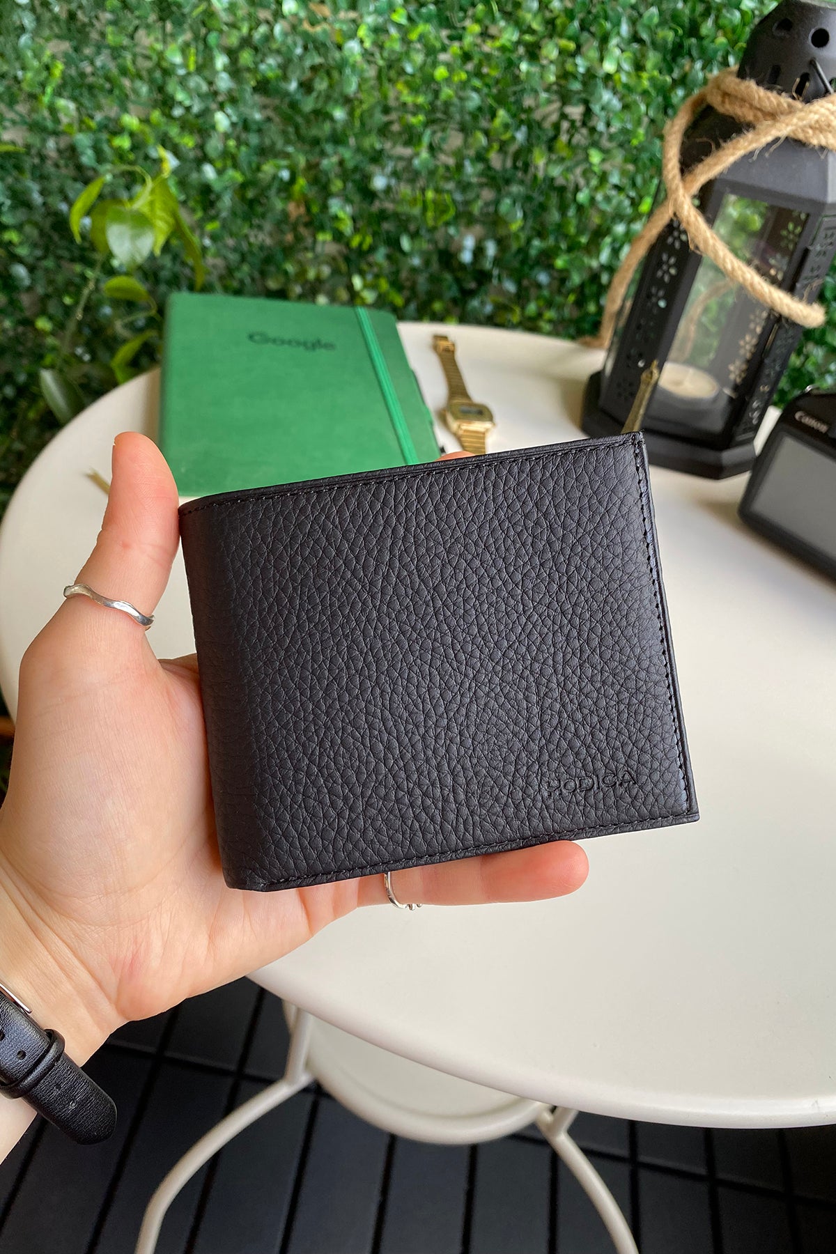 Atlanta Genuine Leather Trifold Wallet in various colors with coin pouch compartment, showcasing its sleek design and high-quality leather.