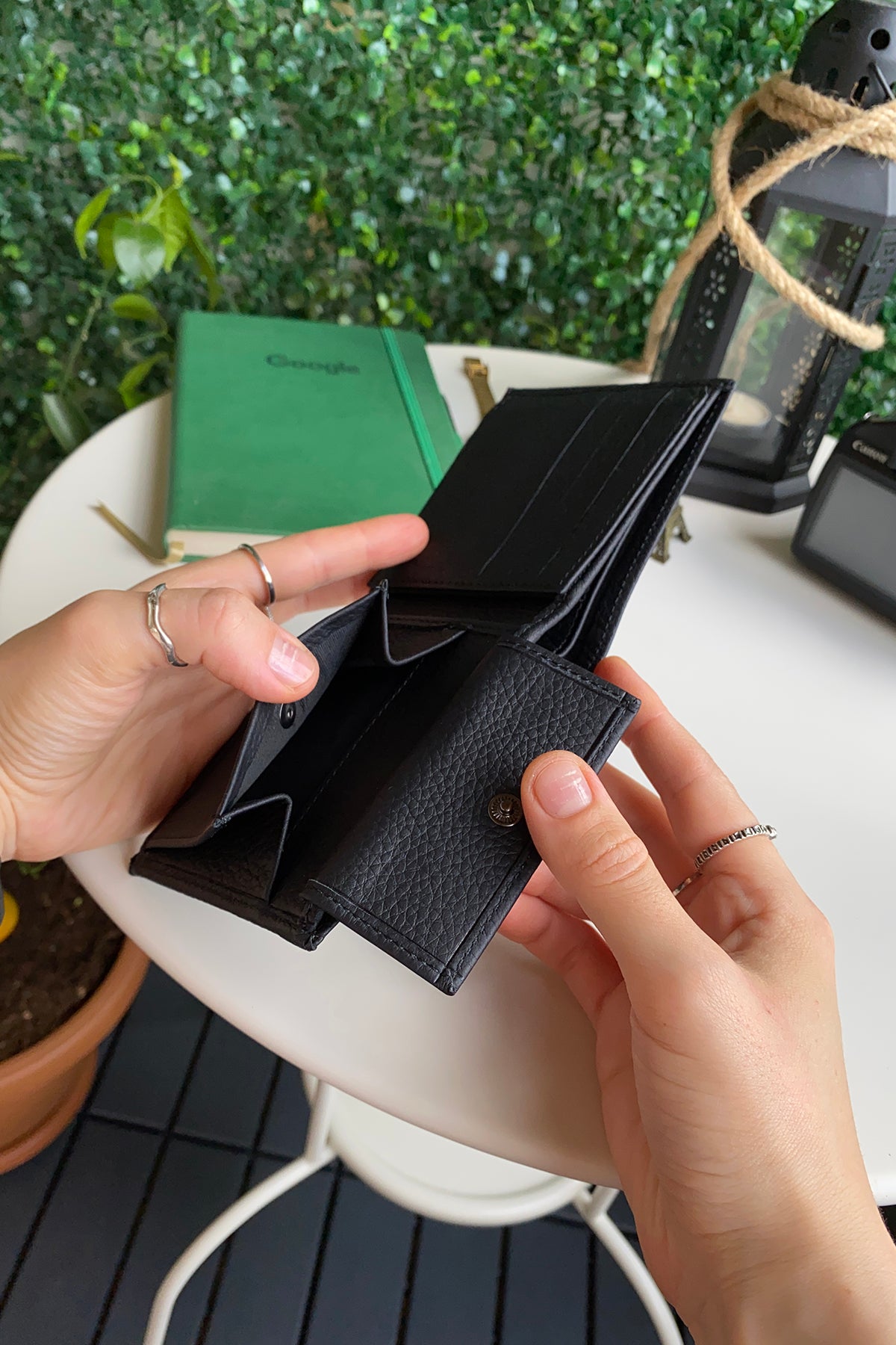 Atlanta Genuine Leather Trifold Wallet in various colors with coin pouch compartment, showcasing its sleek design and high-quality leather.
