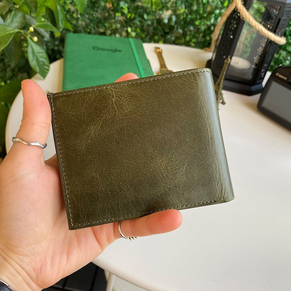 Atlanta Genuine Leather Trifold Wallet in various colors with coin pouch compartment, showcasing its sleek design and high-quality leather.