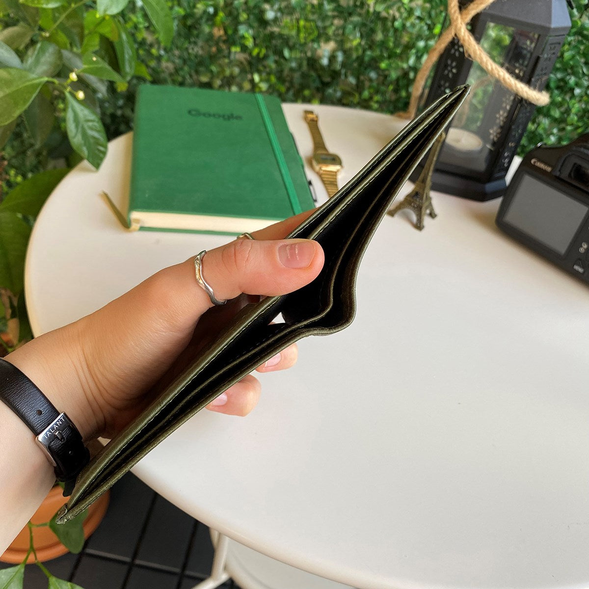 Atlanta Genuine Leather Trifold Wallet in various colors with coin pouch compartment, showcasing its sleek design and high-quality leather.