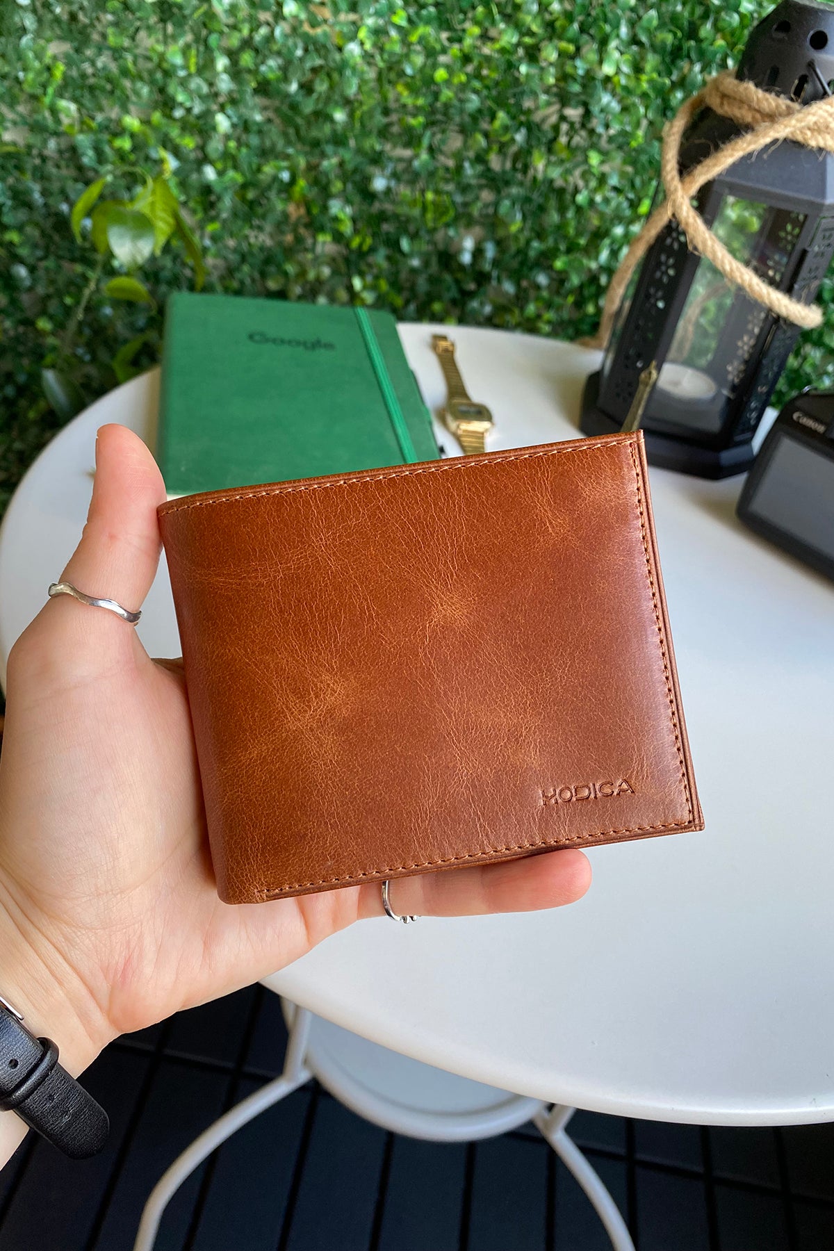 Atlanta Genuine Leather Trifold Wallet in various colors with coin pouch compartment, showcasing its sleek design and high-quality leather.