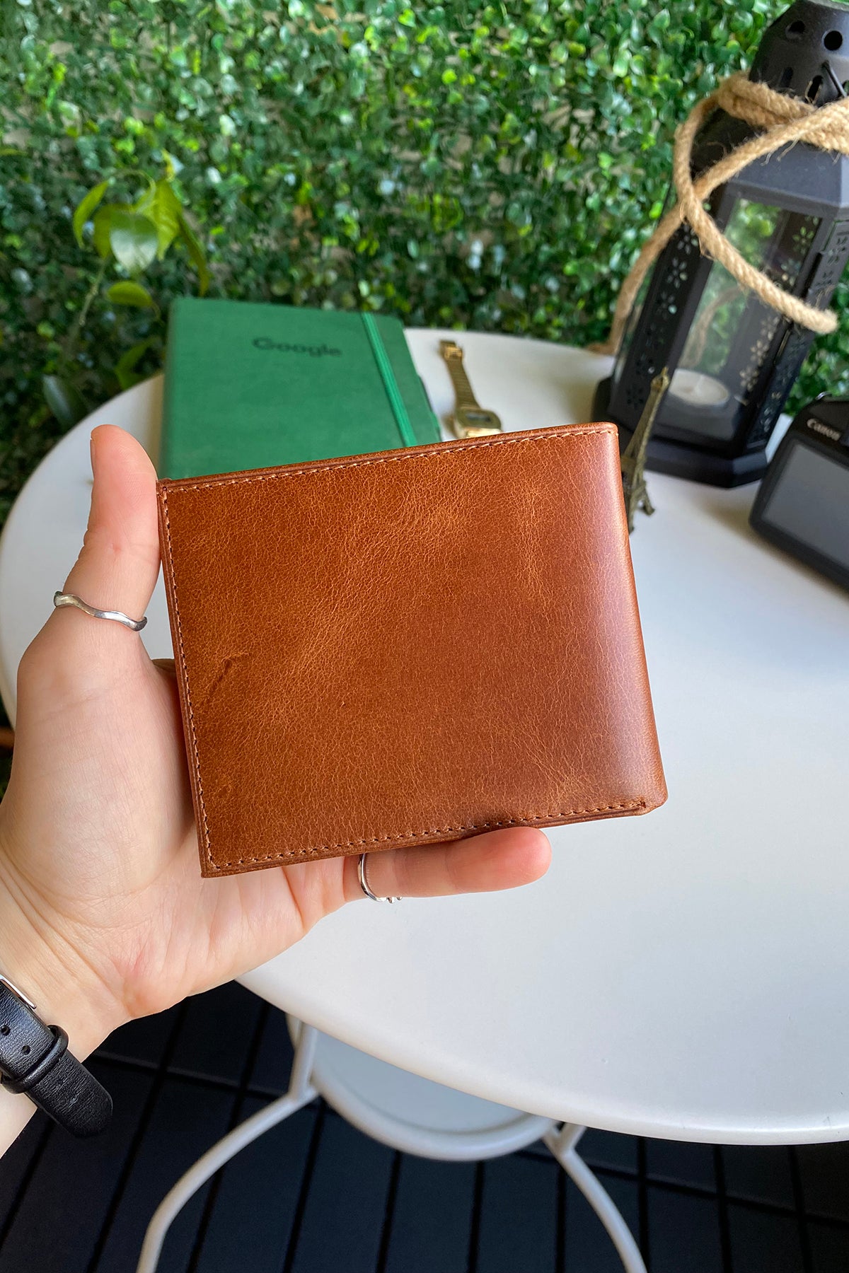 Atlanta Genuine Leather Trifold Wallet in various colors with coin pouch compartment, showcasing its sleek design and high-quality leather.