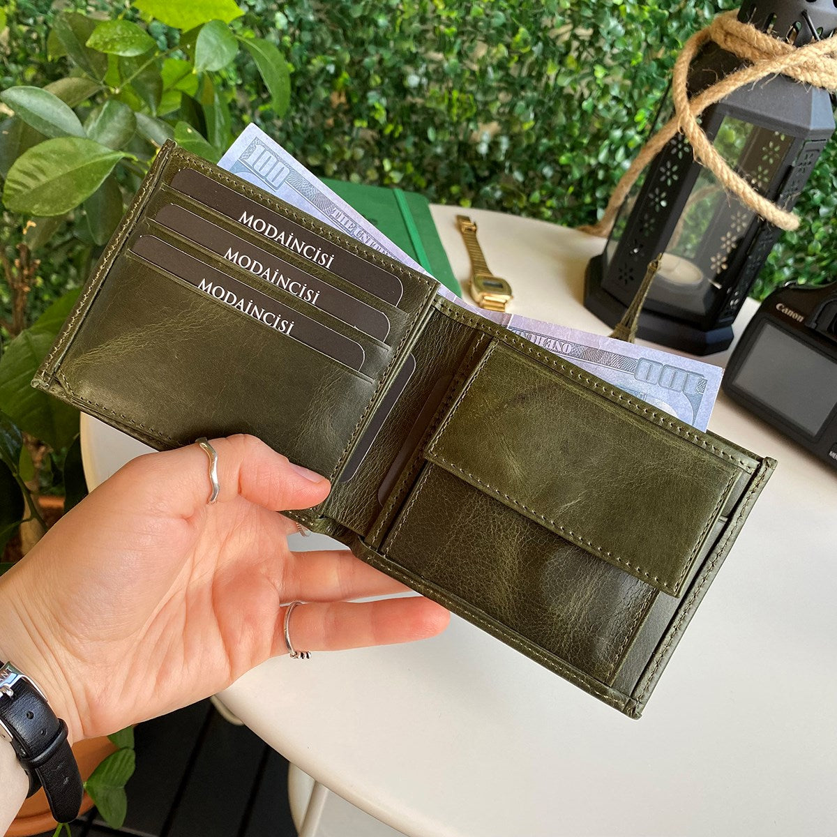Atlanta Genuine Leather Trifold Wallet in various colors with coin pouch compartment, showcasing its sleek design and high-quality leather.