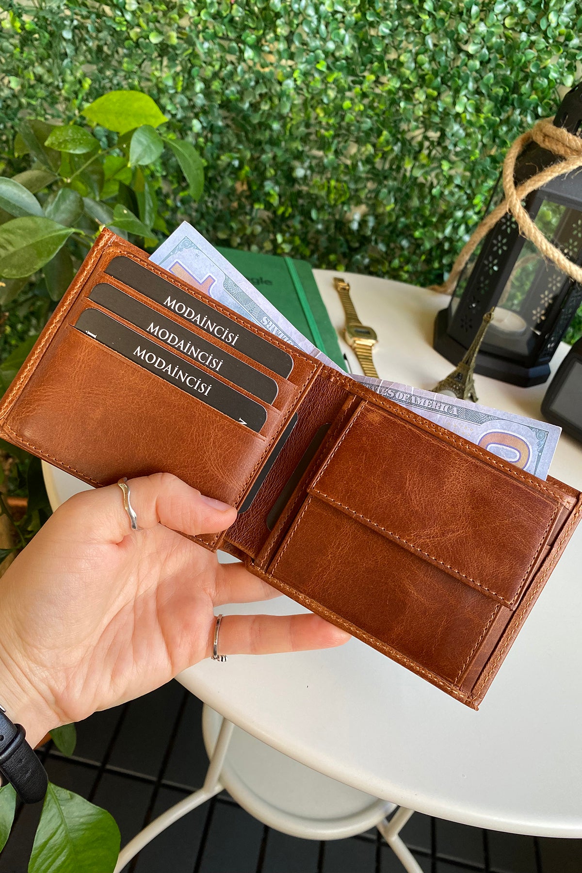 Atlanta Genuine Leather Trifold Wallet in various colors with coin pouch compartment, showcasing its sleek design and high-quality leather.