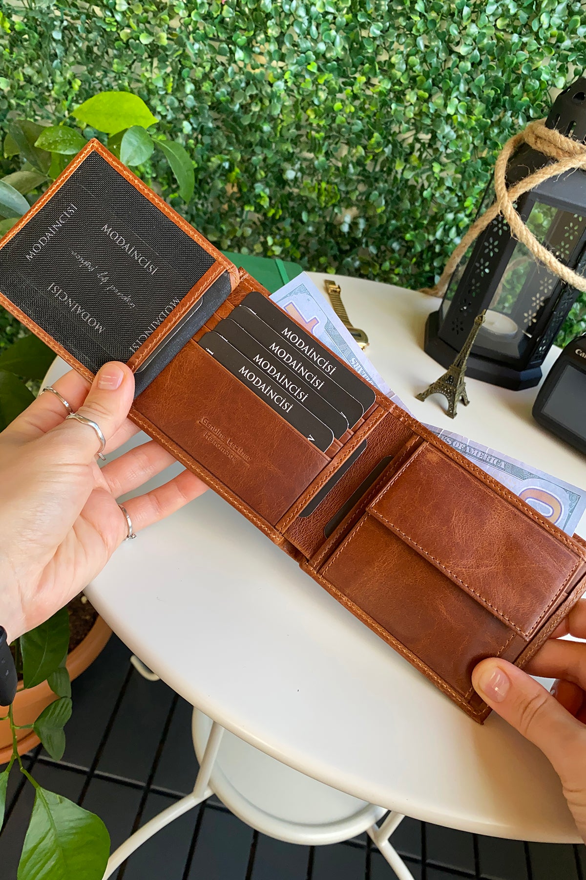 Atlanta Genuine Leather Trifold Wallet in various colors with coin pouch compartment, showcasing its sleek design and high-quality leather.