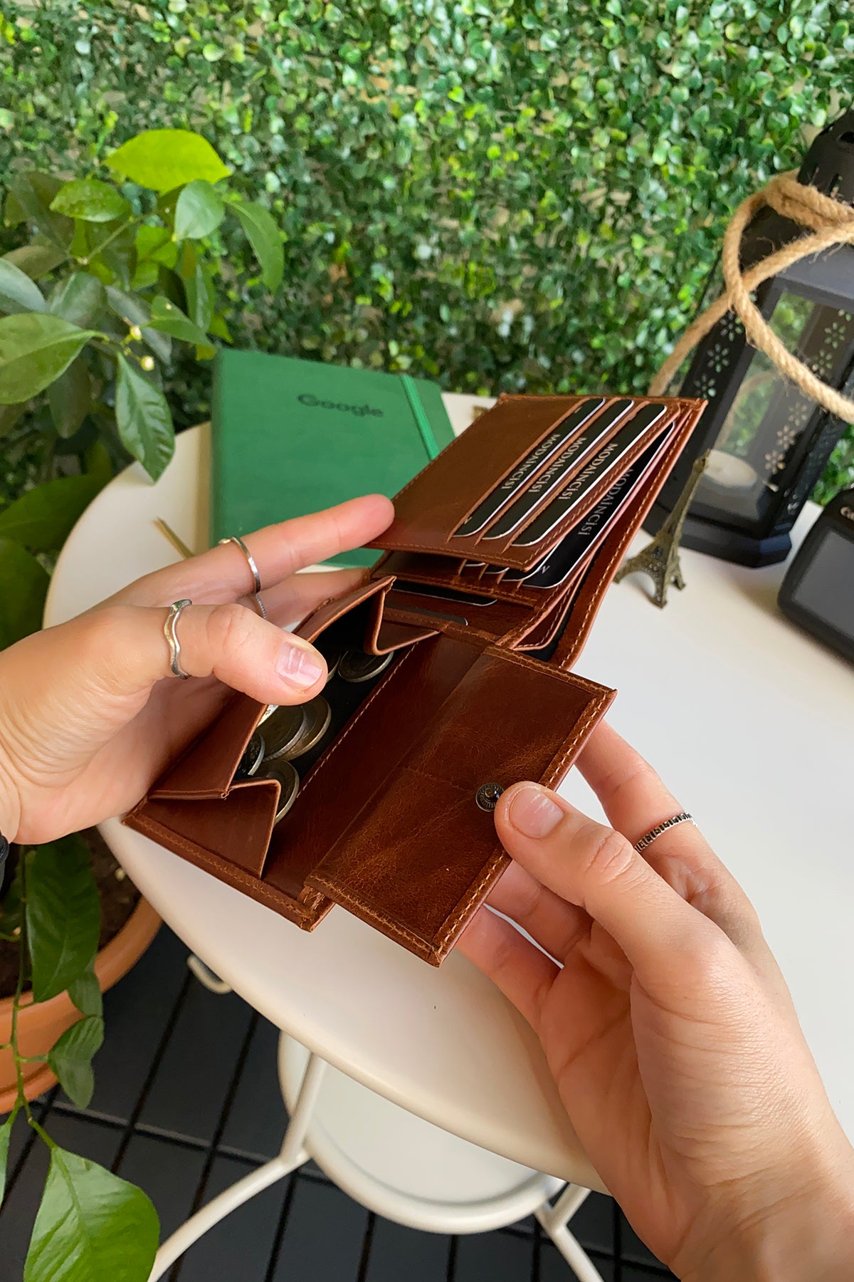 Atlanta Genuine Leather Trifold Wallet in various colors with coin pouch compartment, showcasing its sleek design and high-quality leather.