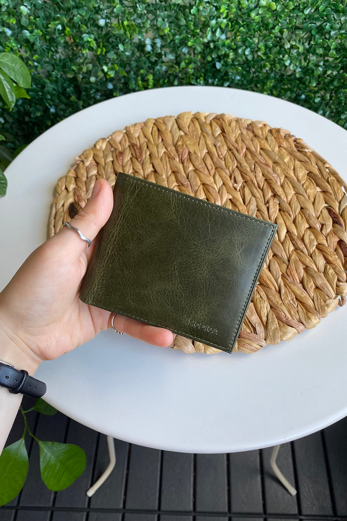 Atlanta Genuine Leather Trifold Wallet in various colors with coin pouch compartment, showcasing its sleek design and high-quality leather.