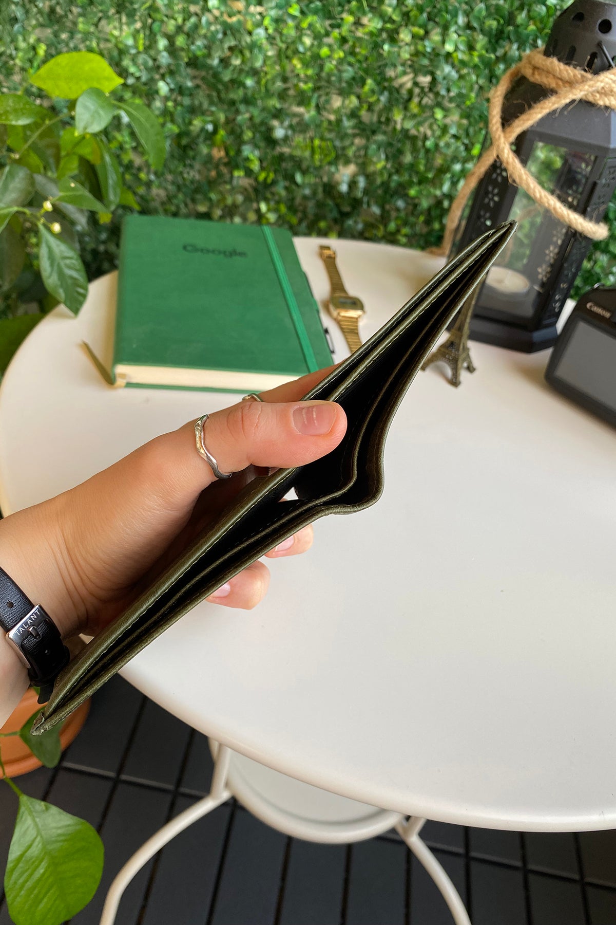 Atlanta Genuine Leather Trifold Wallet in various colors with coin pouch compartment, showcasing its sleek design and high-quality leather.