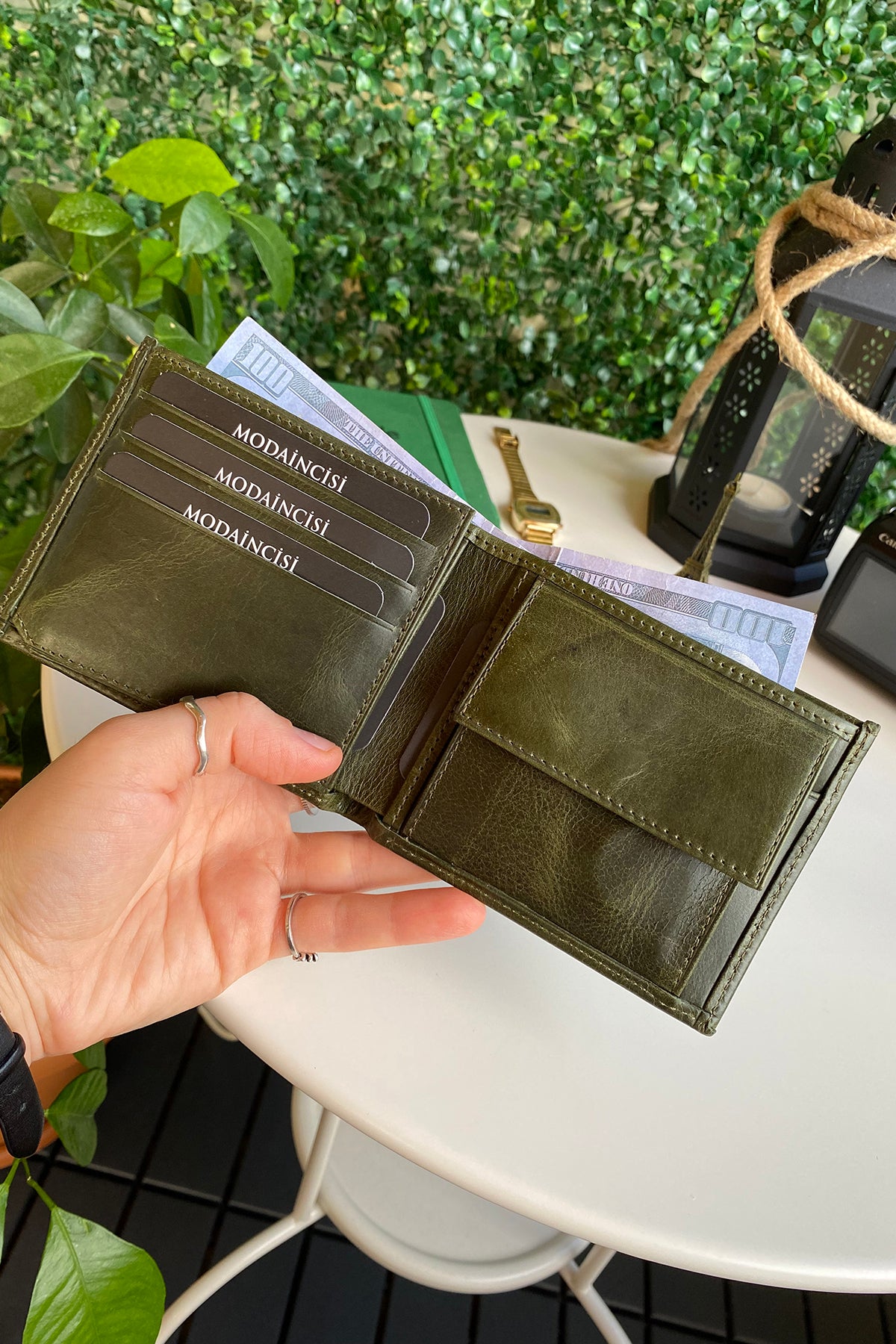 Atlanta Genuine Leather Trifold Wallet in various colors with coin pouch compartment, showcasing its sleek design and high-quality leather.