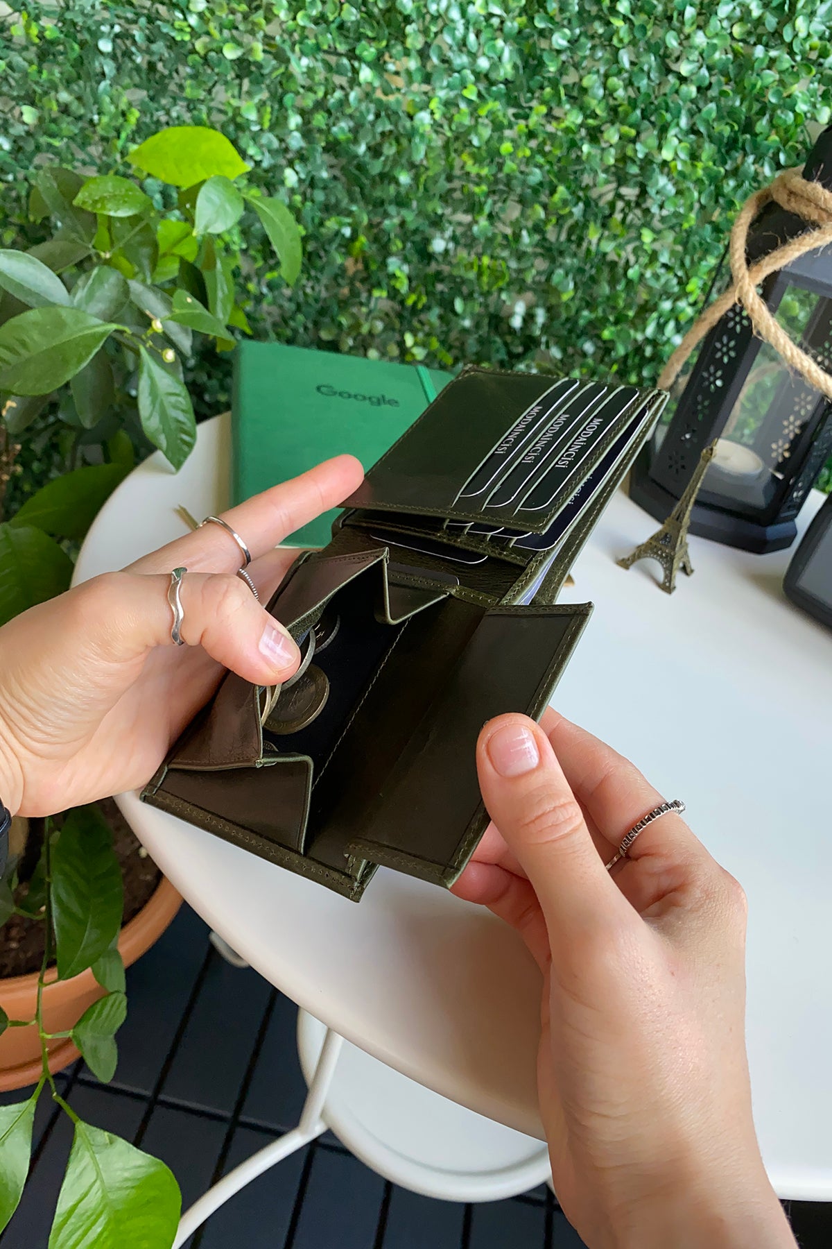 Atlanta Genuine Leather Trifold Wallet in various colors with coin pouch compartment, showcasing its sleek design and high-quality leather.