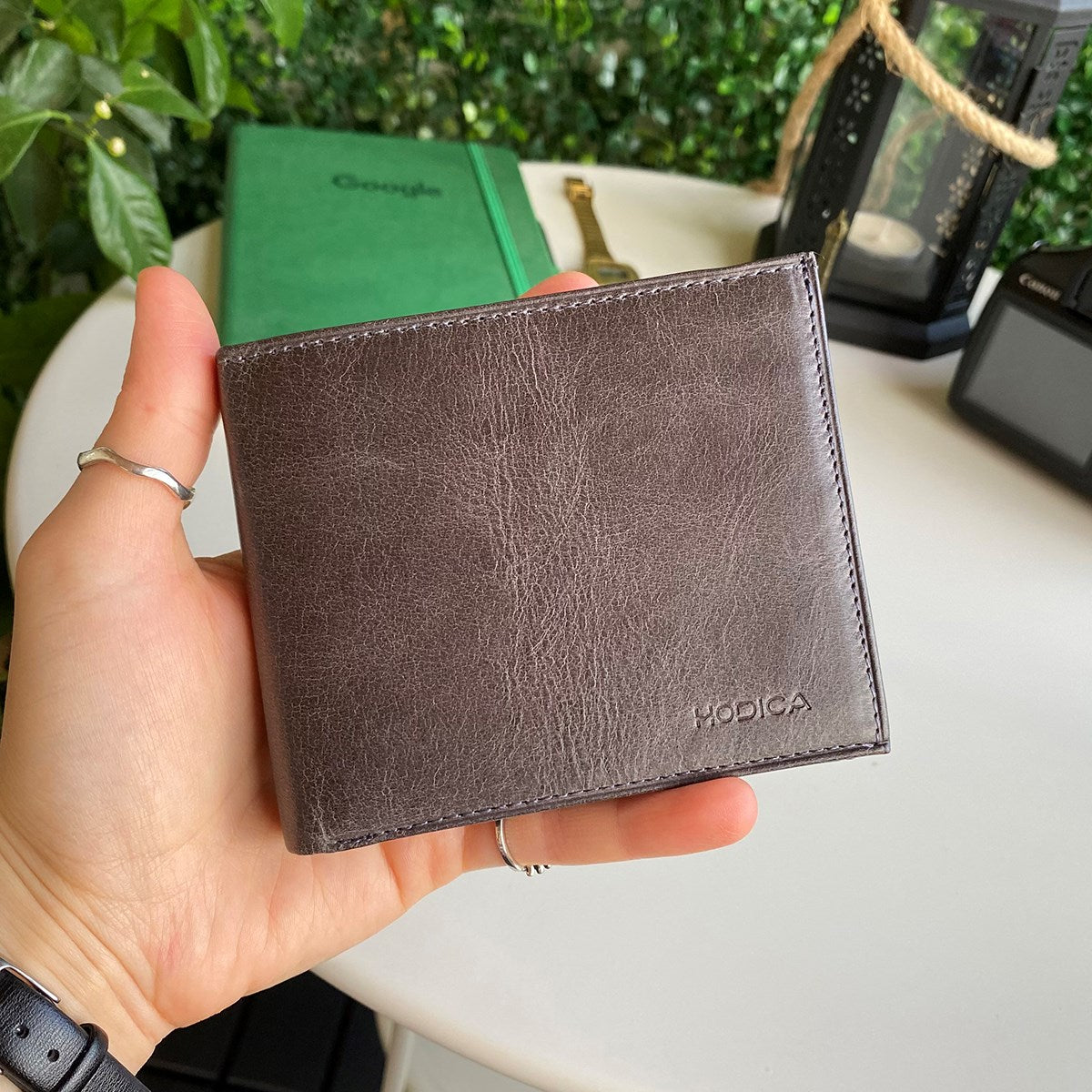 Atlanta Genuine Leather Trifold Wallet in various colors with coin pouch compartment, showcasing its sleek design and high-quality leather.