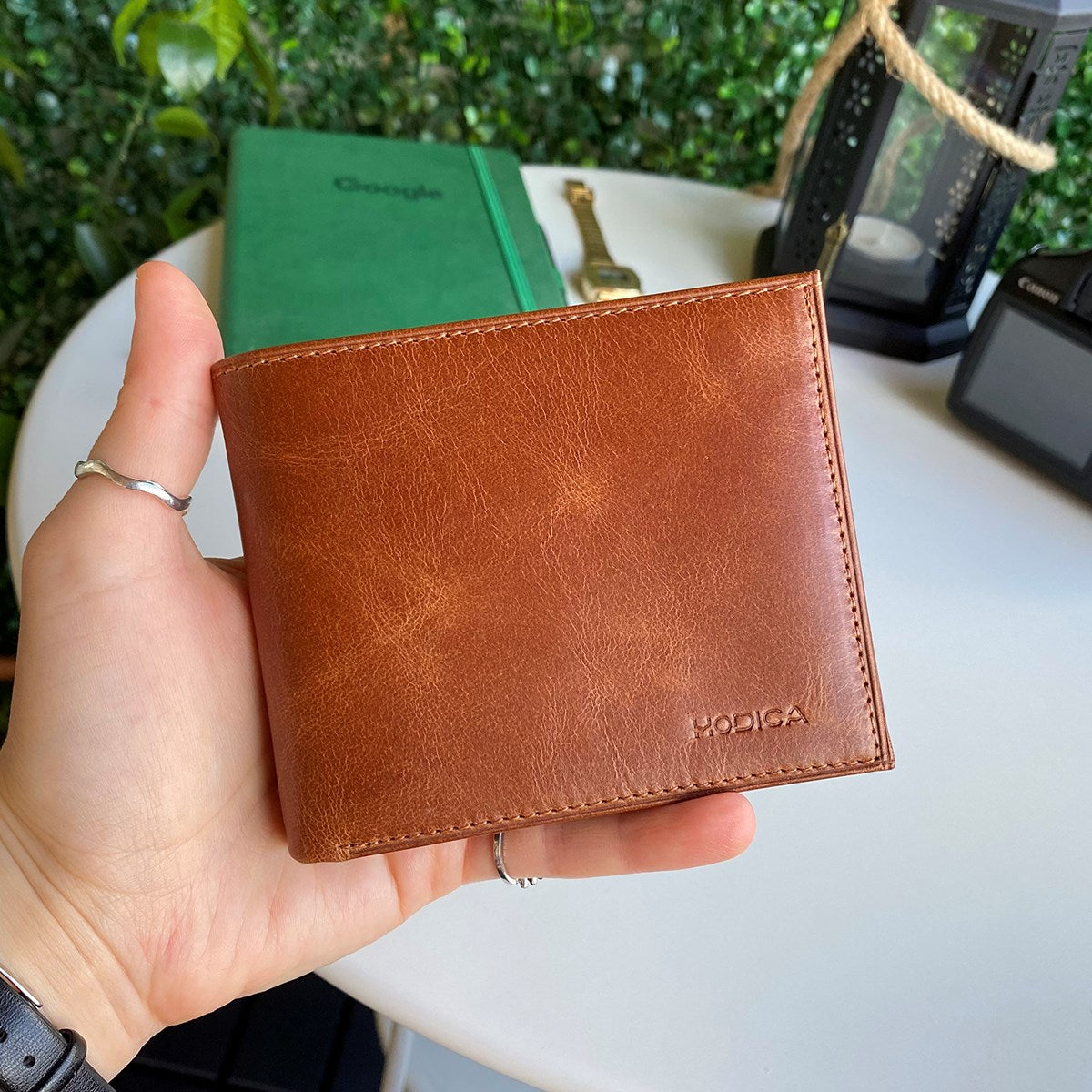 Atlanta Genuine Leather Trifold Wallet in various colors with coin pouch compartment, showcasing its sleek design and high-quality leather.