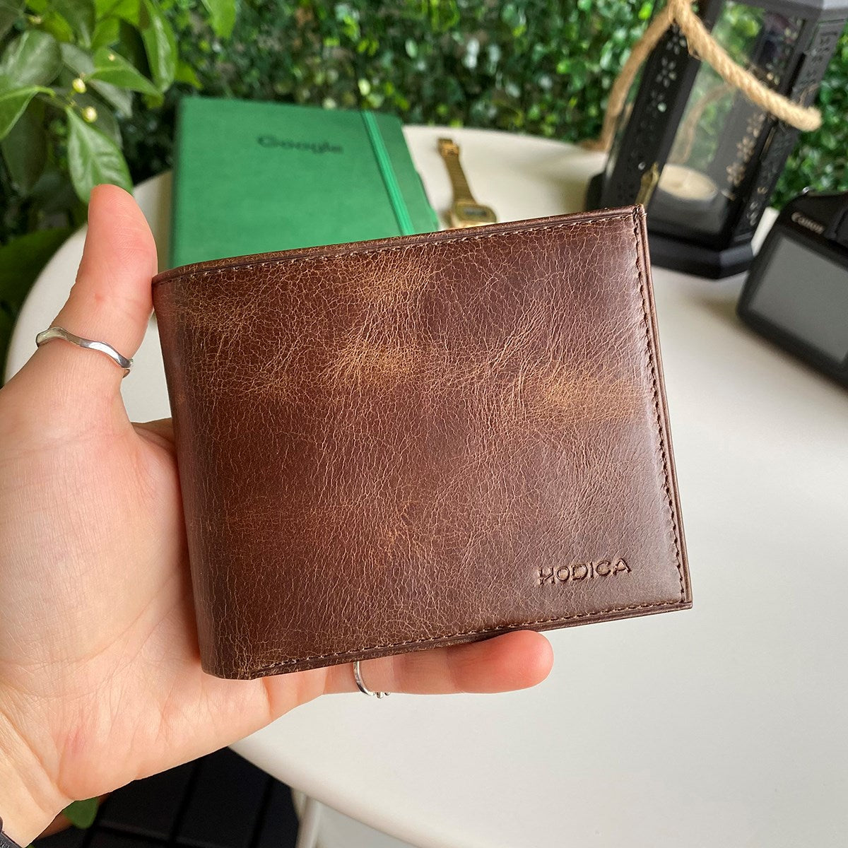 Atlanta Genuine Leather Trifold Wallet in various colors with coin pouch compartment, showcasing its sleek design and high-quality leather.