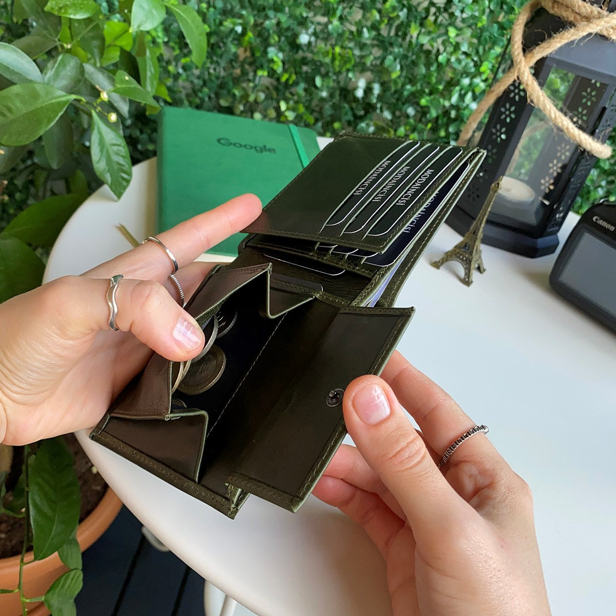 Atlanta Genuine Leather Trifold Wallet in various colors with coin pouch compartment, showcasing its sleek design and high-quality leather.