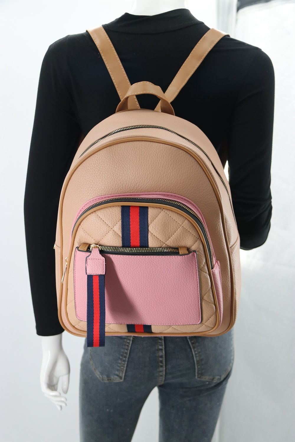 Backpack B2014 featuring a sleek design, padded straps, and multiple compartments for organization.