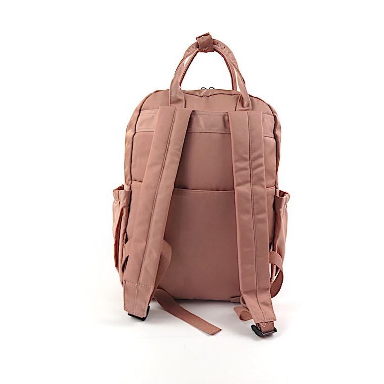 Stylish waterproof backpack for work and university with iPad pocket and multiple zipped compartments.