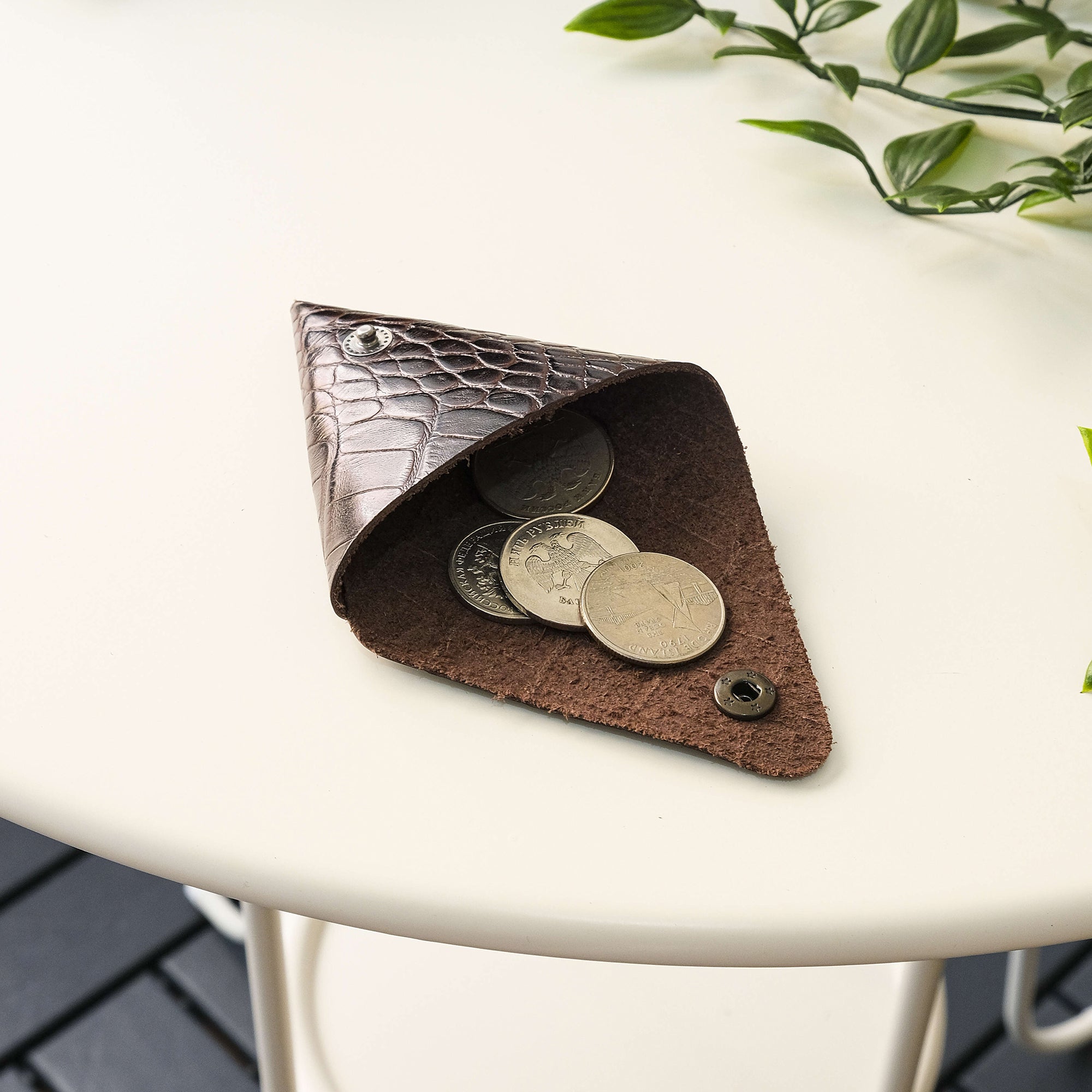 Bamby Genuine Leather Coin Pouch in various colors, showcasing its minimalist and stitchless design.