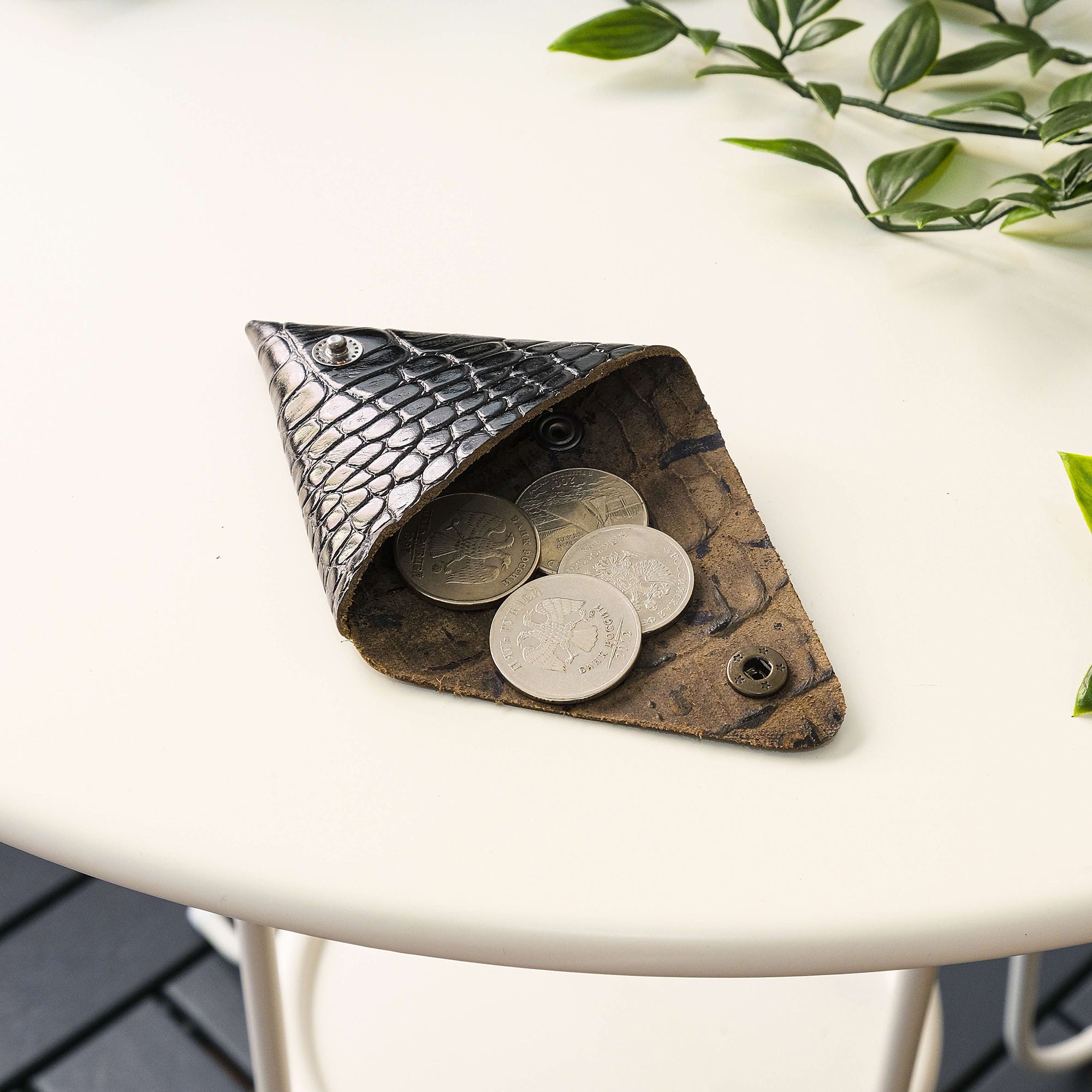 Bamby Genuine Leather Coin Pouch in various colors, showcasing its minimalist and stitchless design.
