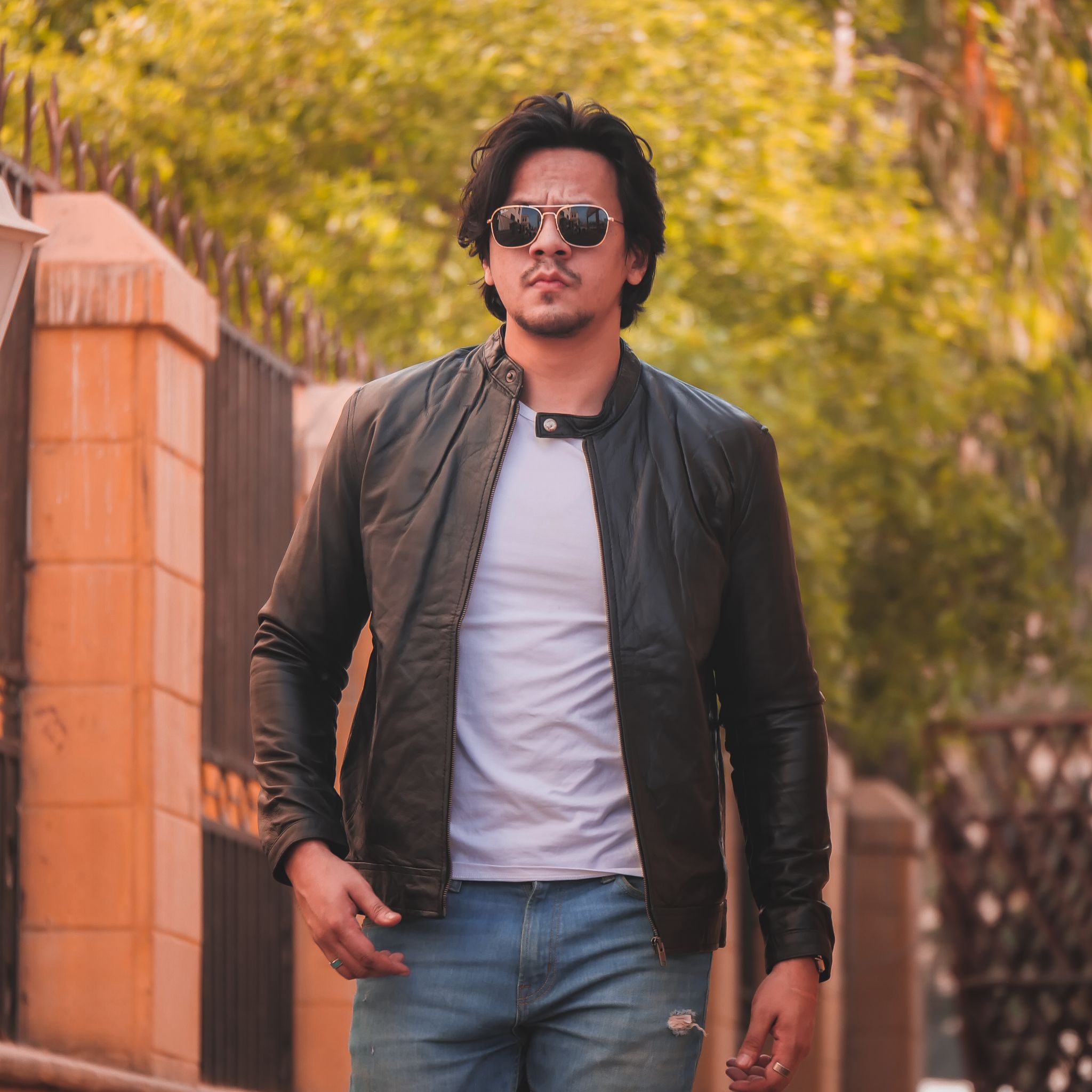 Black mens pure sheep leather zipper jacket with a modern fit and snap button collar, showcasing premium craftsmanship and stylish design.