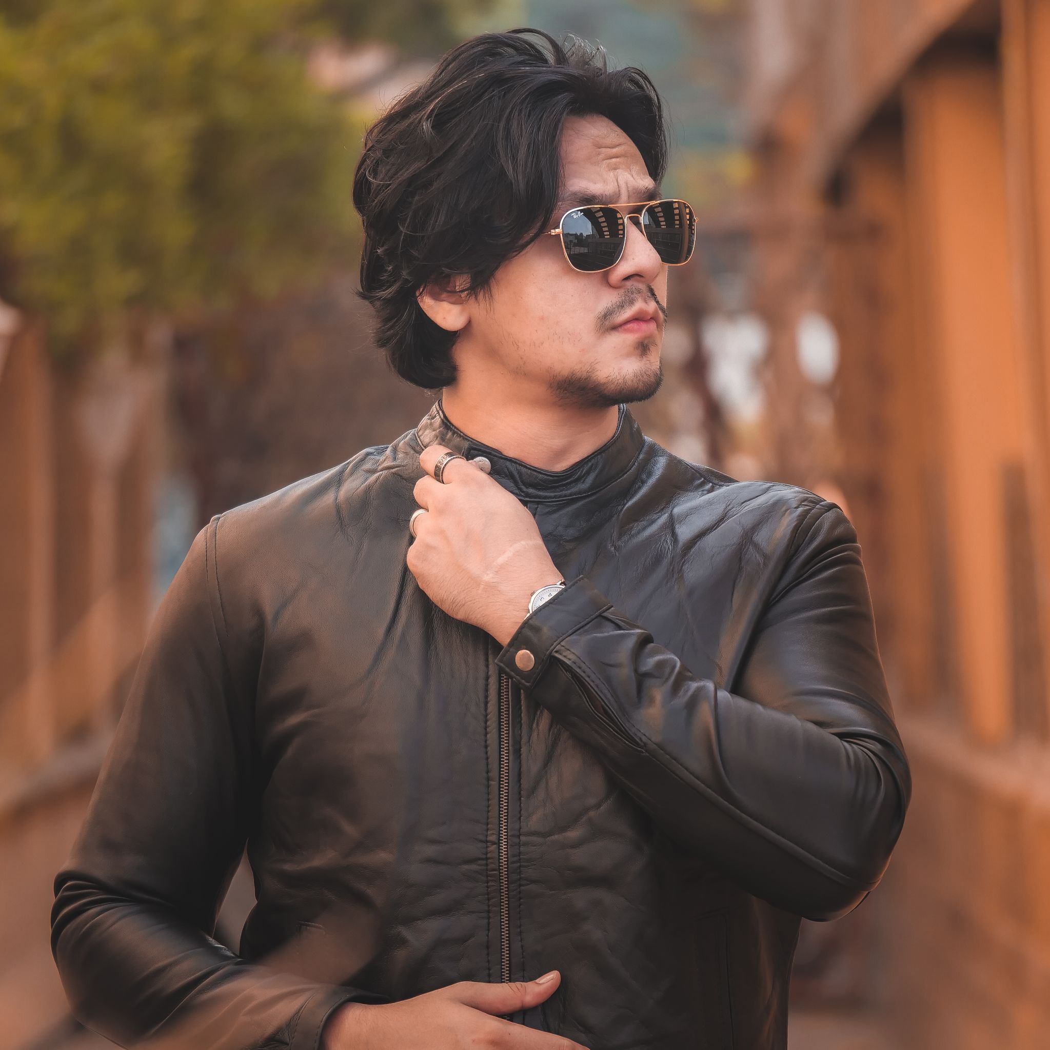 Black mens pure sheep leather zipper jacket with a modern fit and snap button collar, showcasing premium craftsmanship and stylish design.