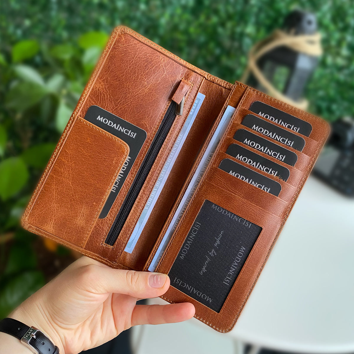 Boston Genuine Leather Wallet featuring a phone socket and multiple compartments in a stylish design.