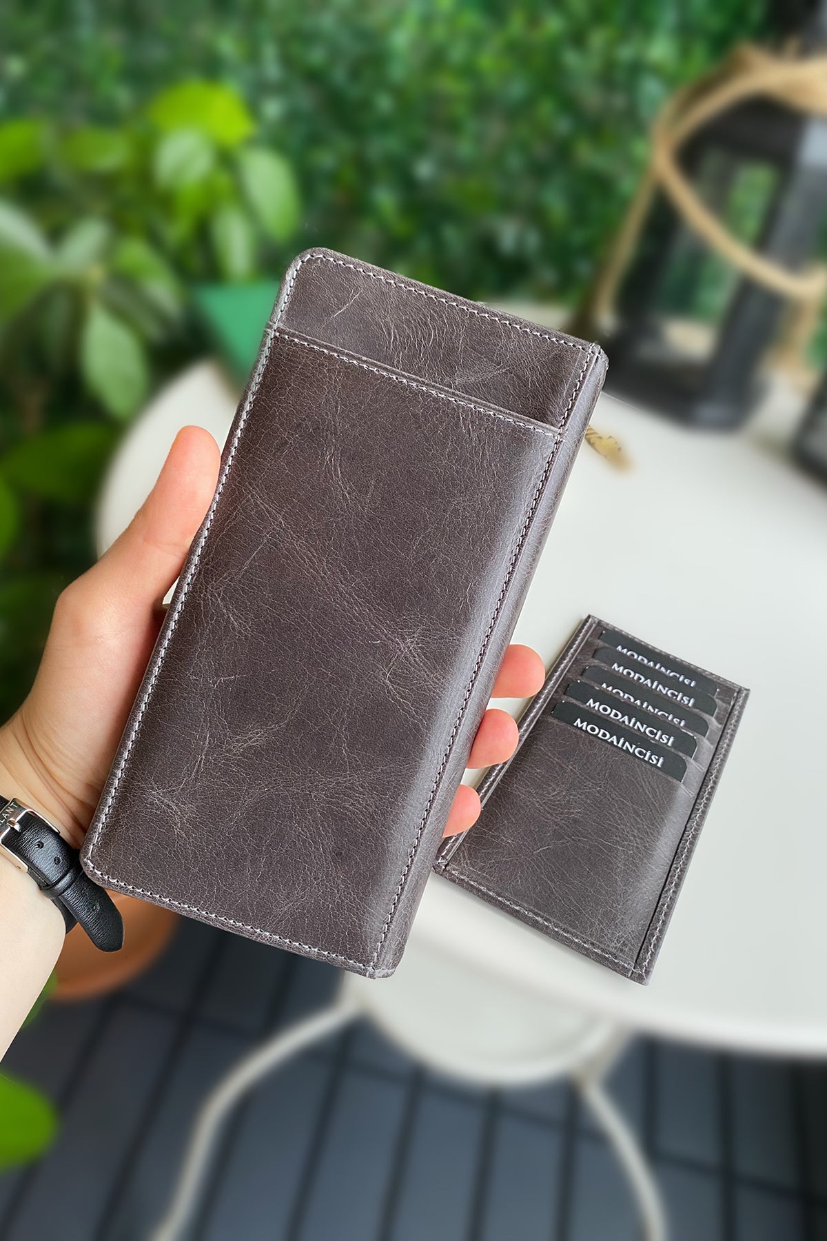 Boston Genuine Leather Wallet featuring a phone socket and multiple compartments in a stylish design.