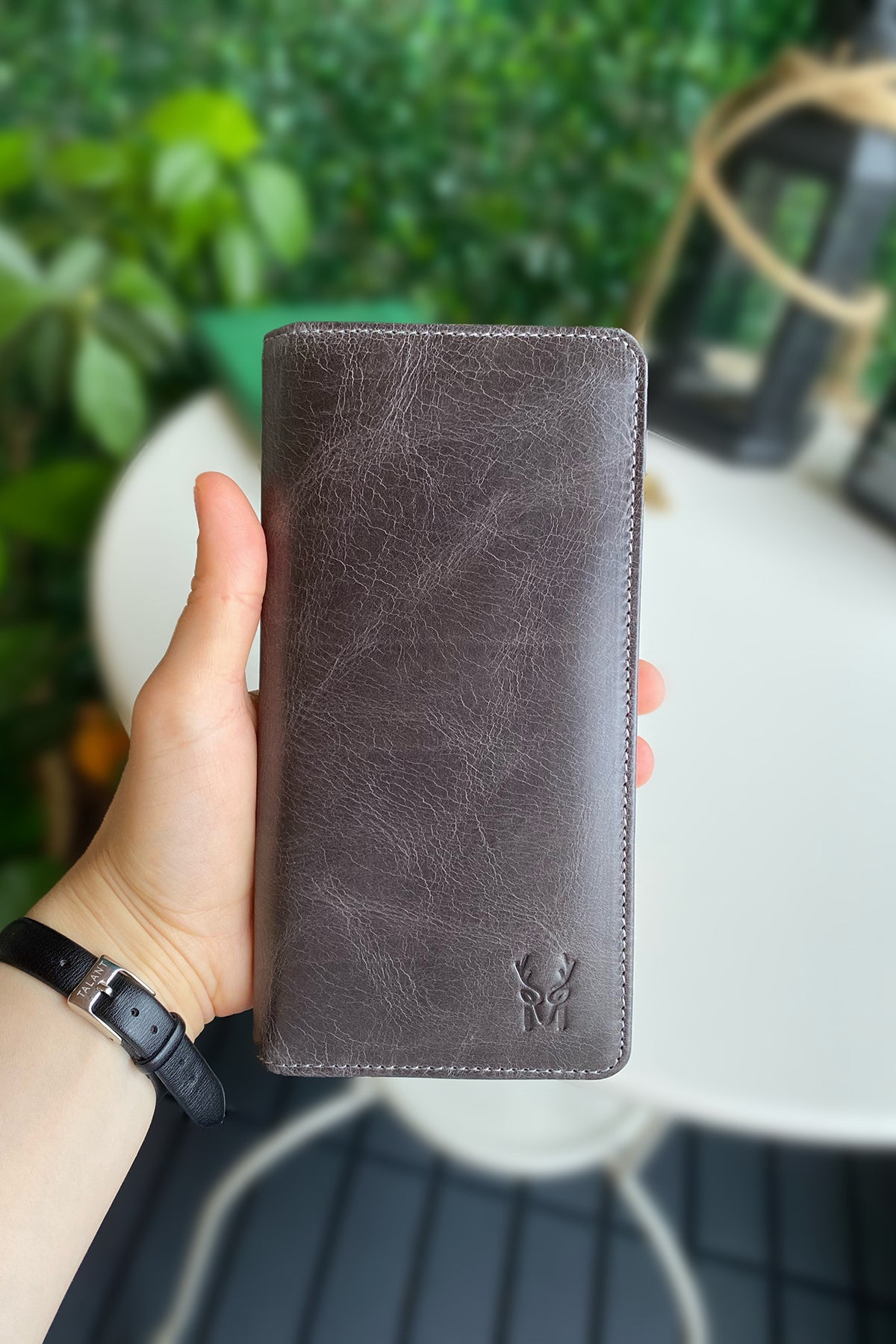 Boston Genuine Leather Wallet featuring a phone socket and multiple compartments in a stylish design.