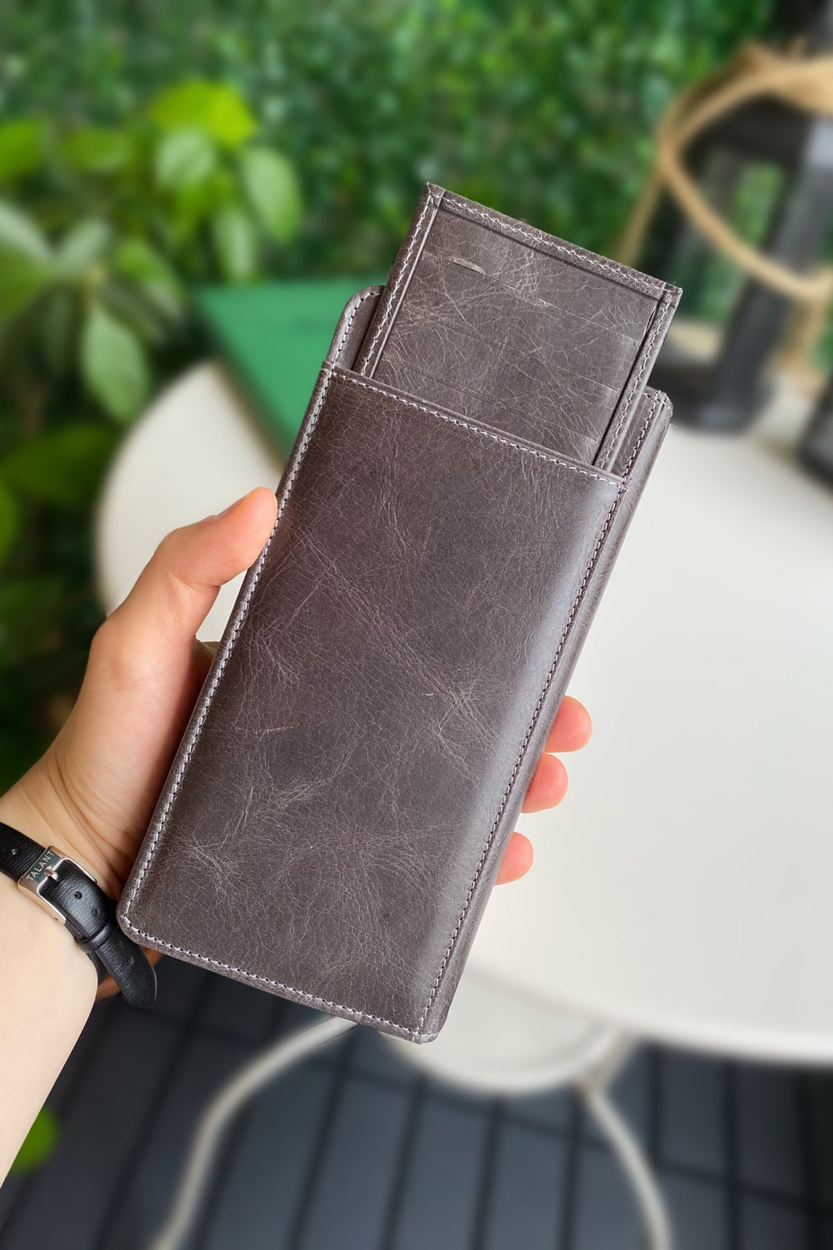 Boston Genuine Leather Wallet featuring a phone socket and multiple compartments in a stylish design.