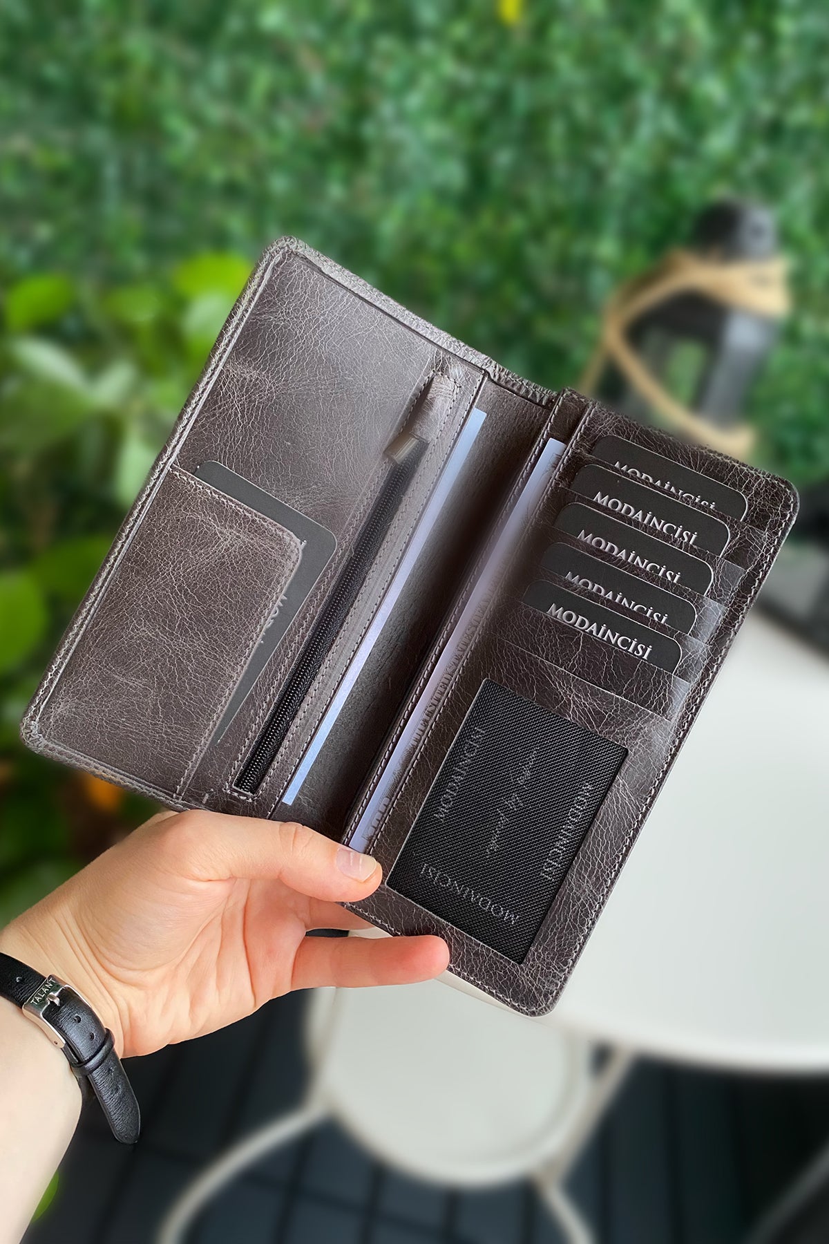 Boston Genuine Leather Wallet featuring a phone socket and multiple compartments in a stylish design.