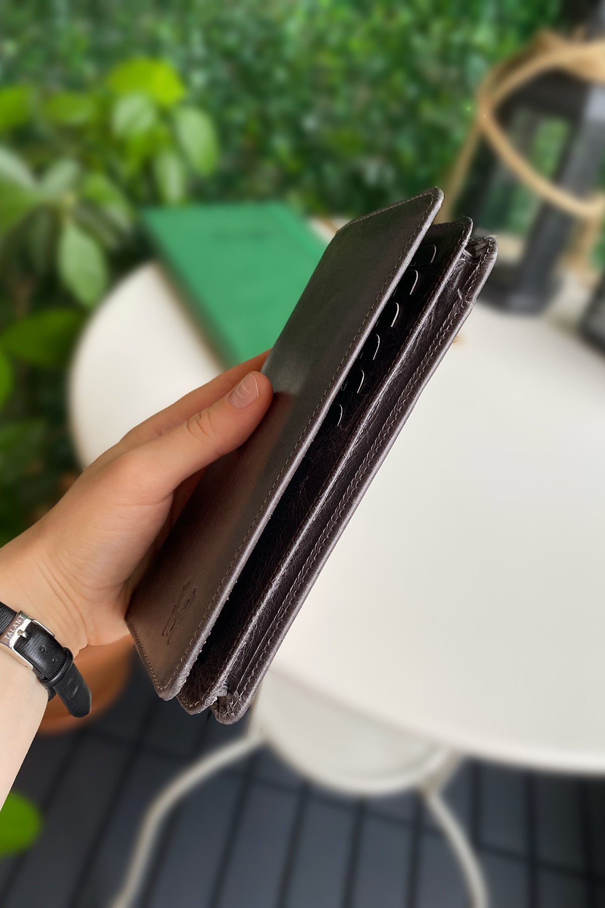 Boston Genuine Leather Wallet featuring a phone socket and multiple compartments in a stylish design.