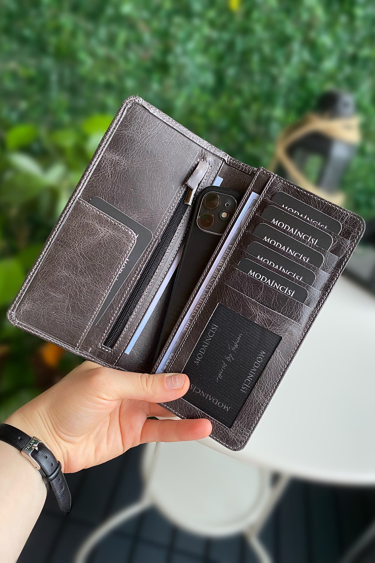 Boston Genuine Leather Wallet featuring a phone socket and multiple compartments in a stylish design.