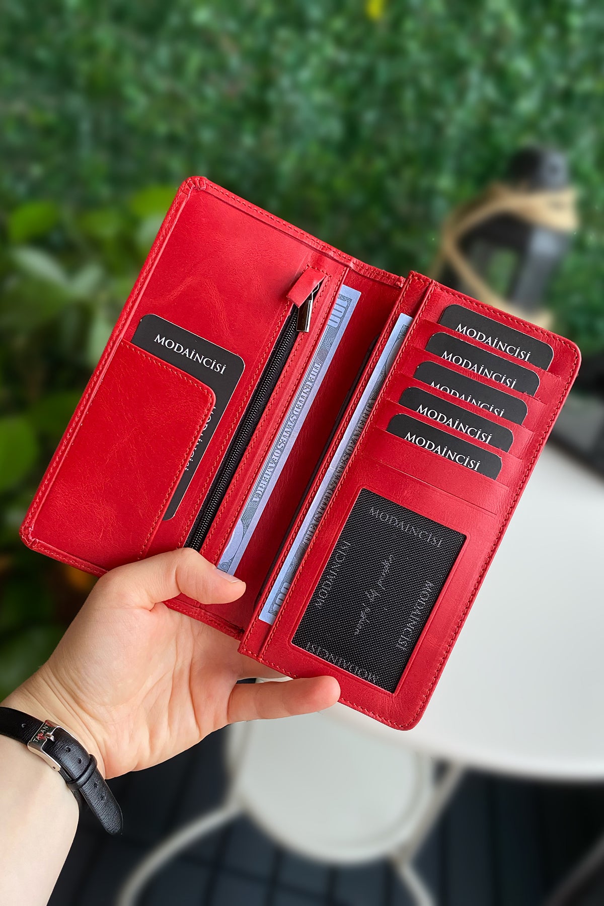 Boston Genuine Leather Wallet featuring a phone socket and multiple compartments in a stylish design.