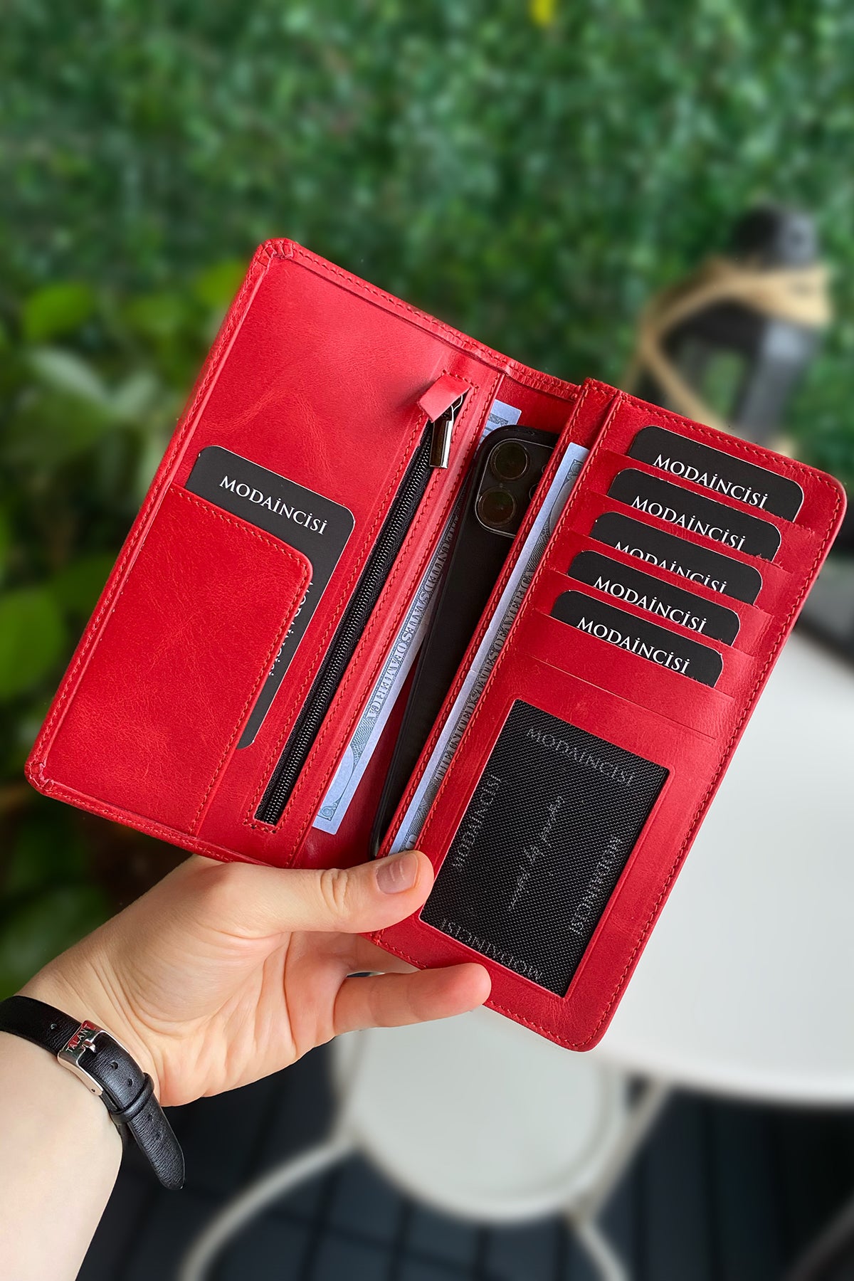 Boston Genuine Leather Wallet featuring a phone socket and multiple compartments in a stylish design.