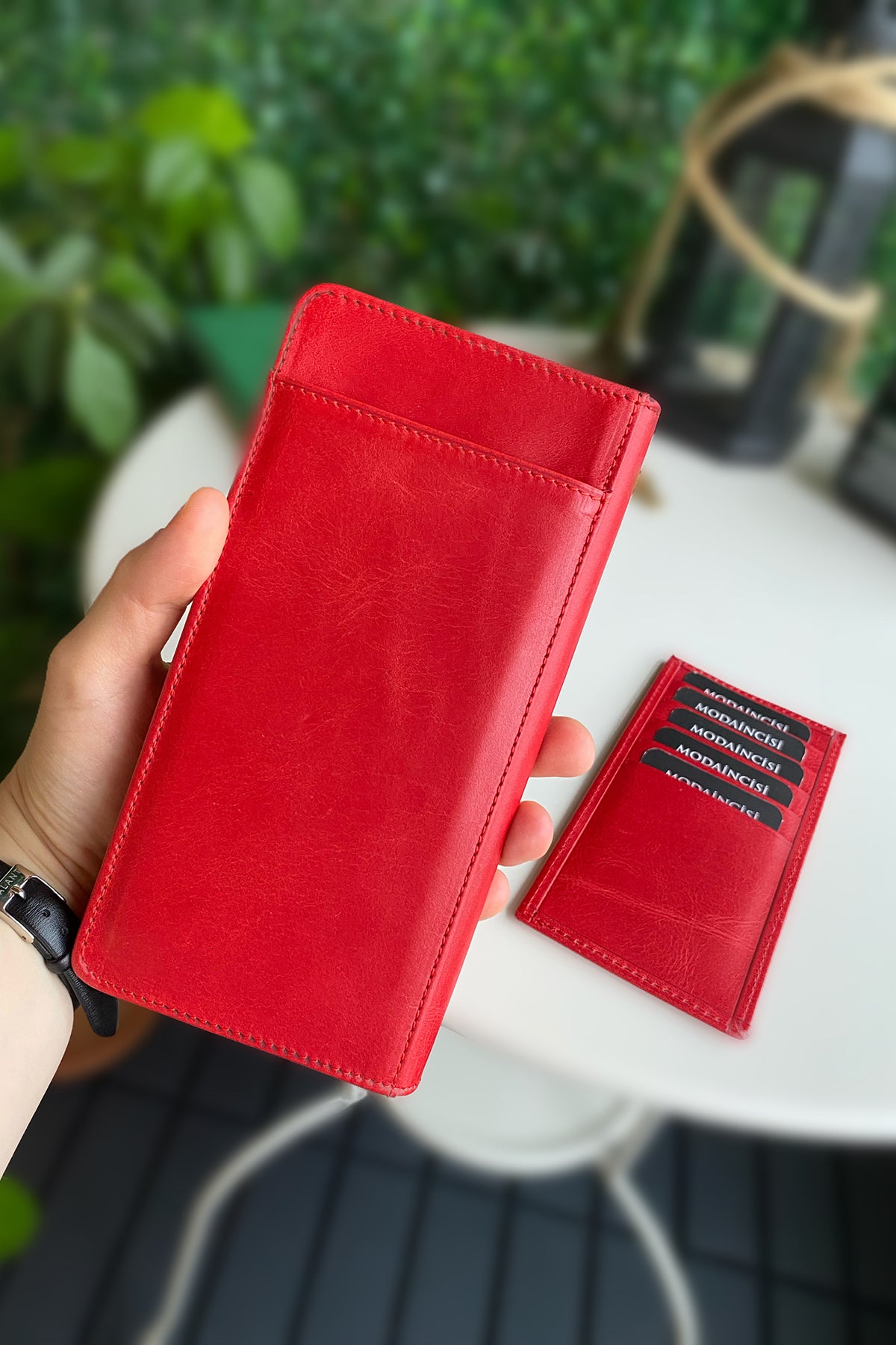 Boston Genuine Leather Wallet featuring a phone socket and multiple compartments in a stylish design.