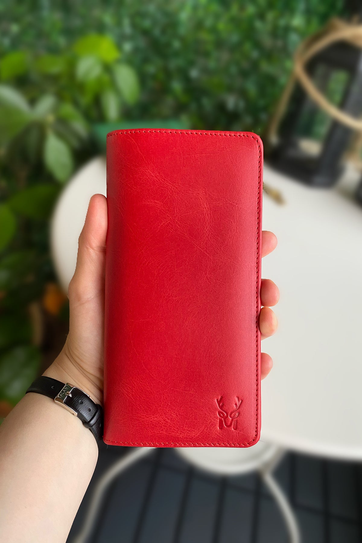 Boston Genuine Leather Wallet featuring a phone socket and multiple compartments in a stylish design.