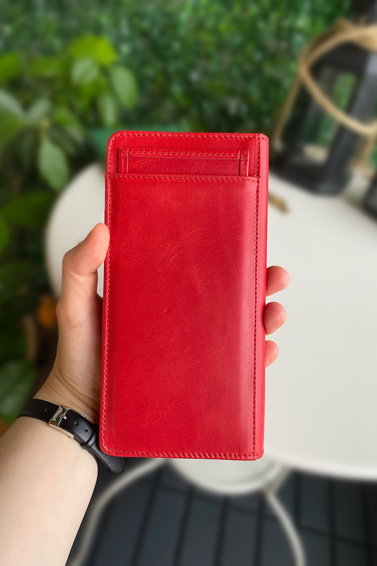 Boston Genuine Leather Wallet featuring a phone socket and multiple compartments in a stylish design.