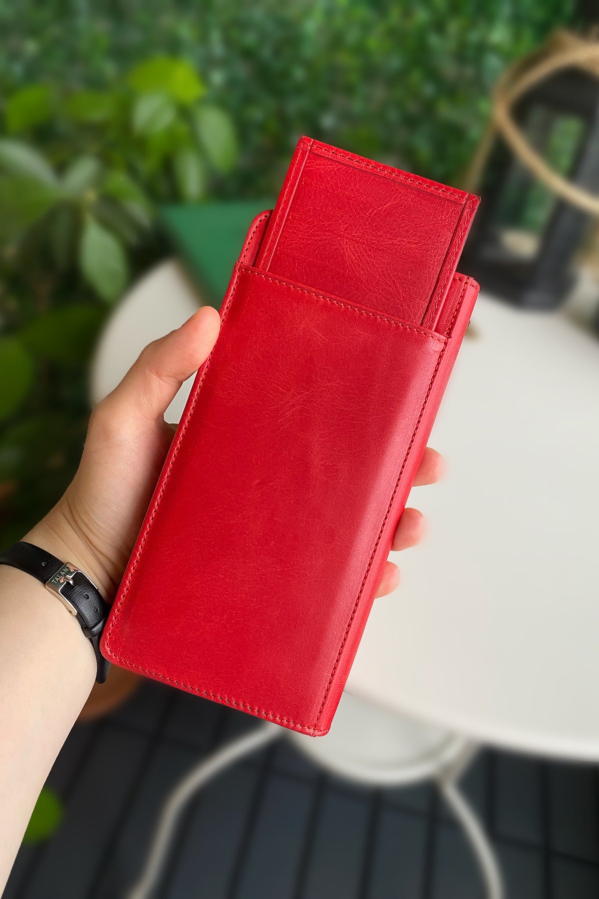 Boston Genuine Leather Wallet featuring a phone socket and multiple compartments in a stylish design.