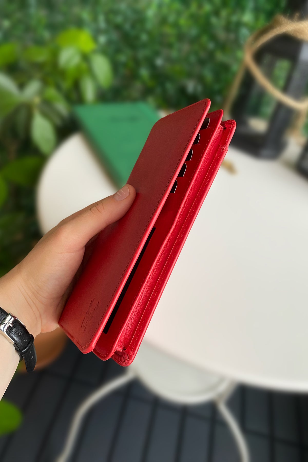 Boston Genuine Leather Wallet featuring a phone socket and multiple compartments in a stylish design.