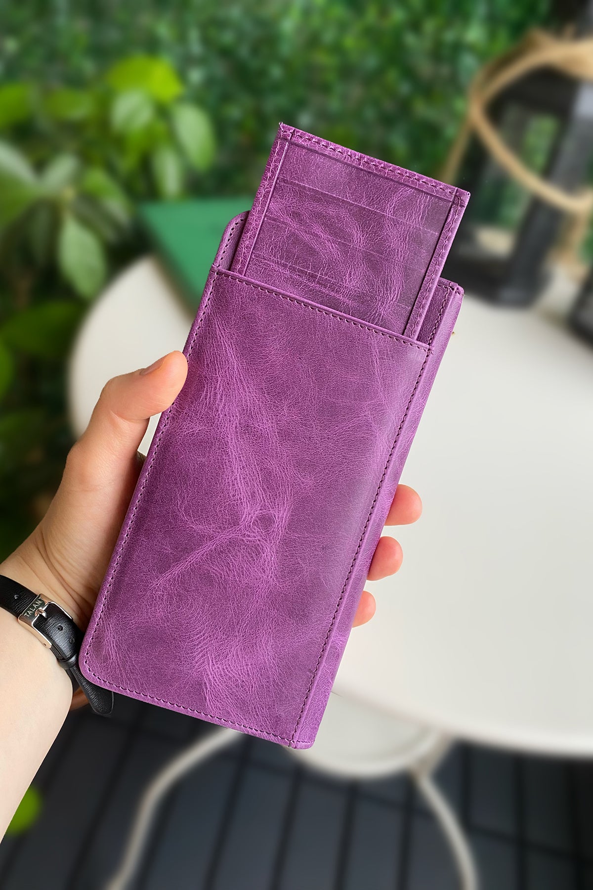 Boston Genuine Leather Wallet featuring a phone socket and multiple compartments in a stylish design.