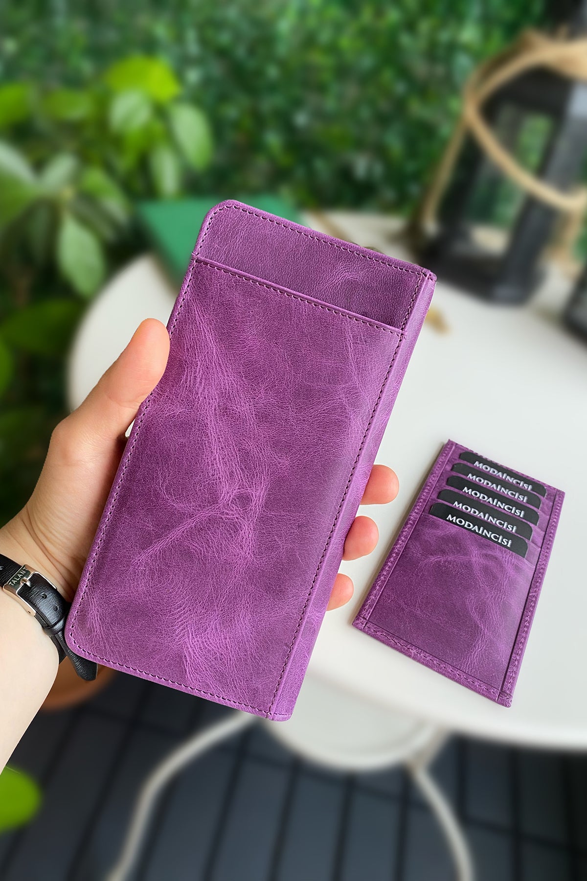 Boston Genuine Leather Wallet featuring a phone socket and multiple compartments in a stylish design.