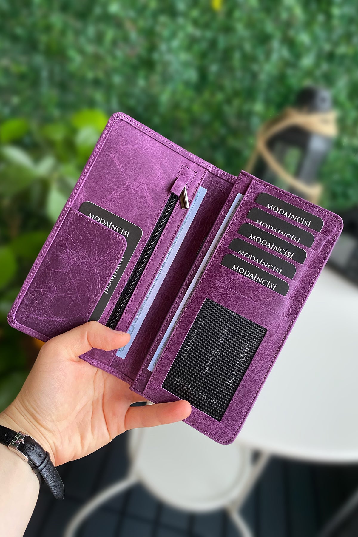 Boston Genuine Leather Wallet featuring a phone socket and multiple compartments in a stylish design.