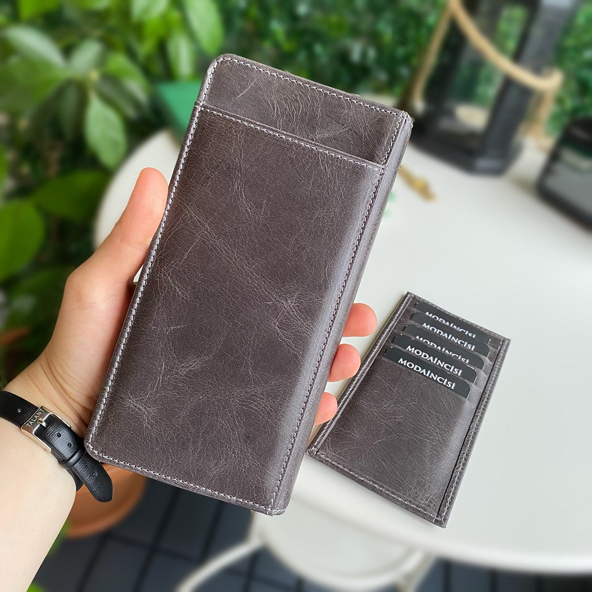 Boston Genuine Leather Wallet featuring a phone socket and multiple compartments in a stylish design.